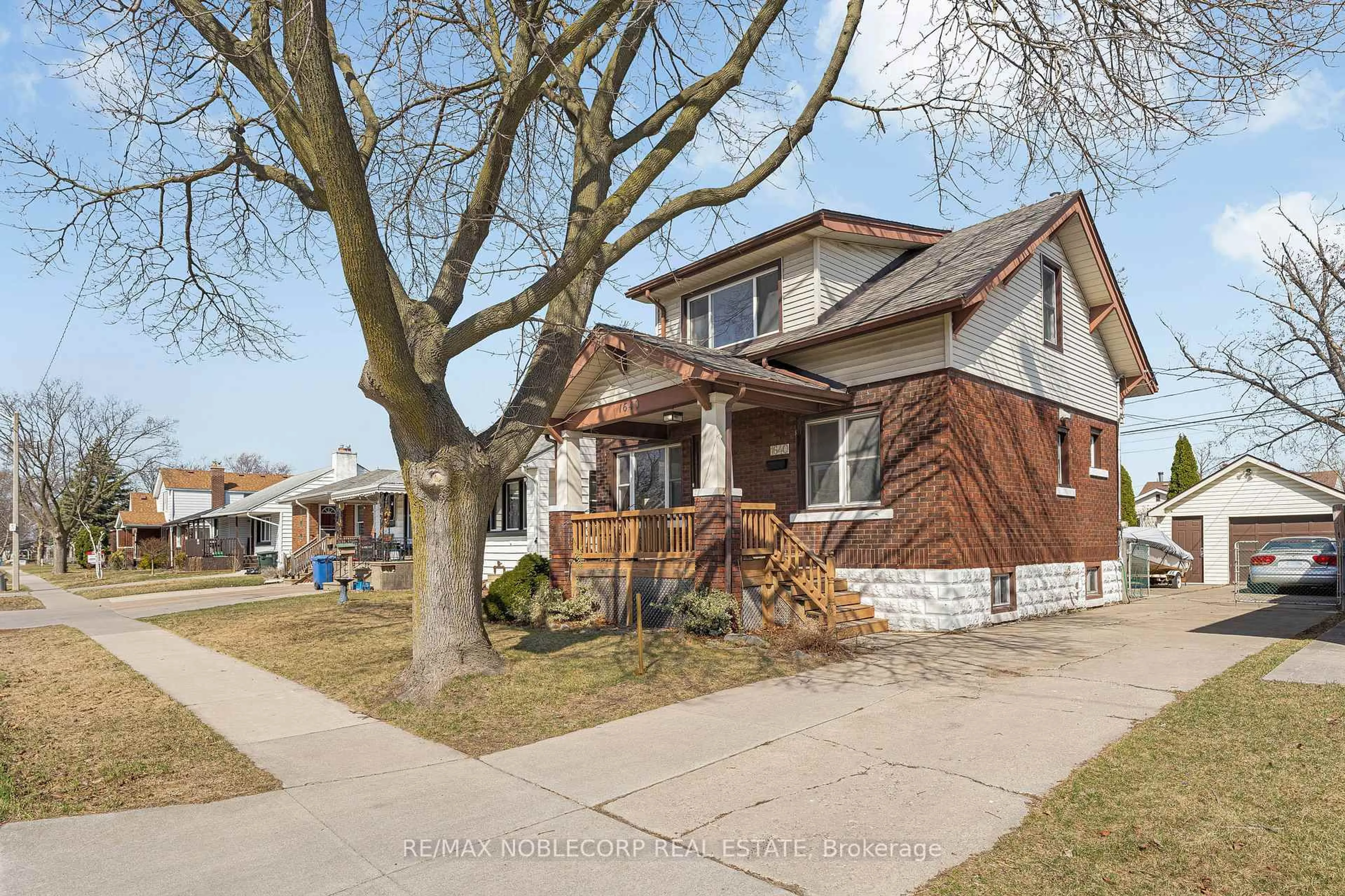 Home with brick exterior material, street for 1640 Pillette Rd, Windsor Ontario N8Y 3C5