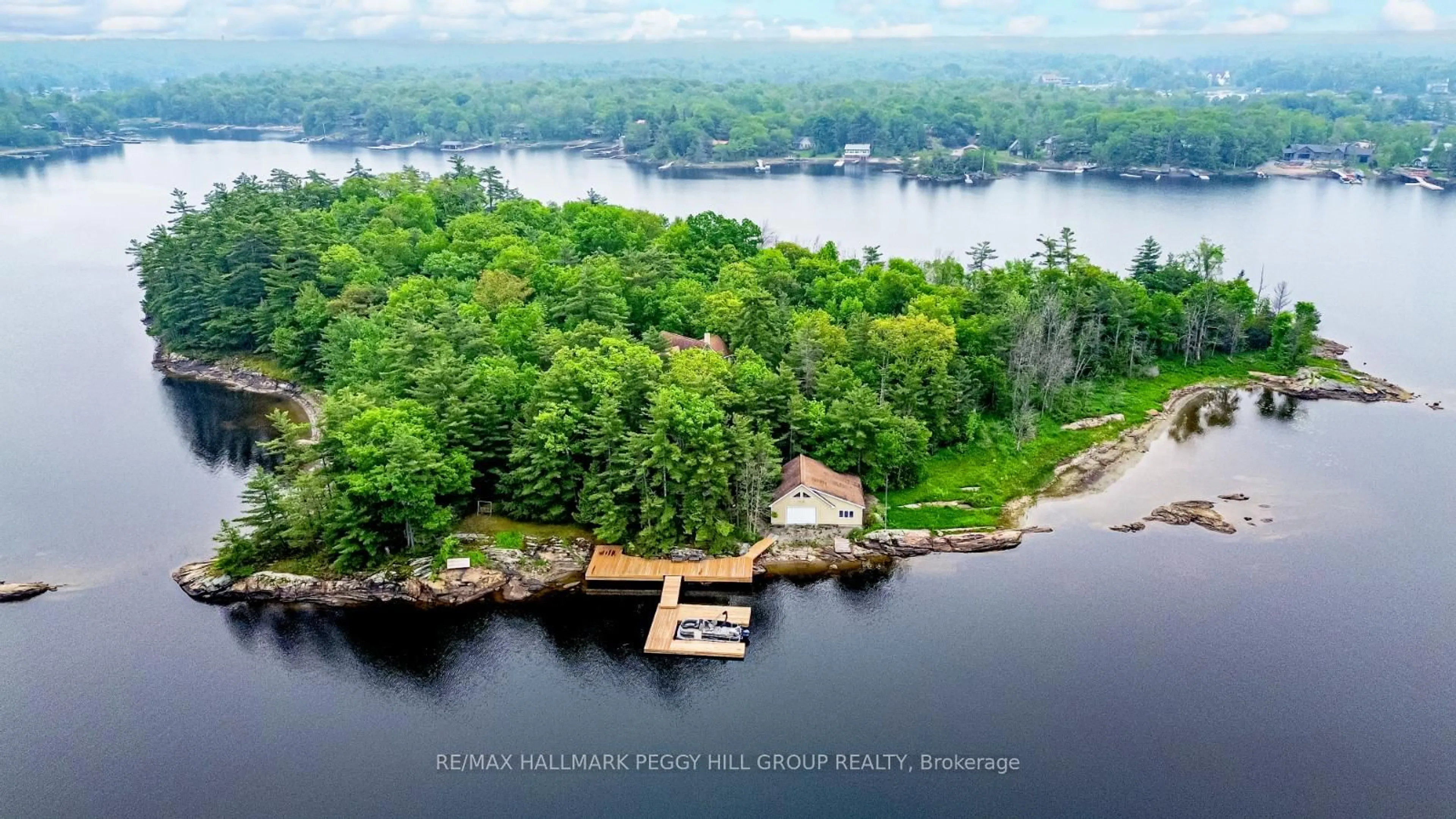 A pic from outside/outdoor area/front of a property/back of a property/a pic from drone, water/lake/river/ocean view for 2 Island 880, Georgian Bay Ontario L0K 1S0