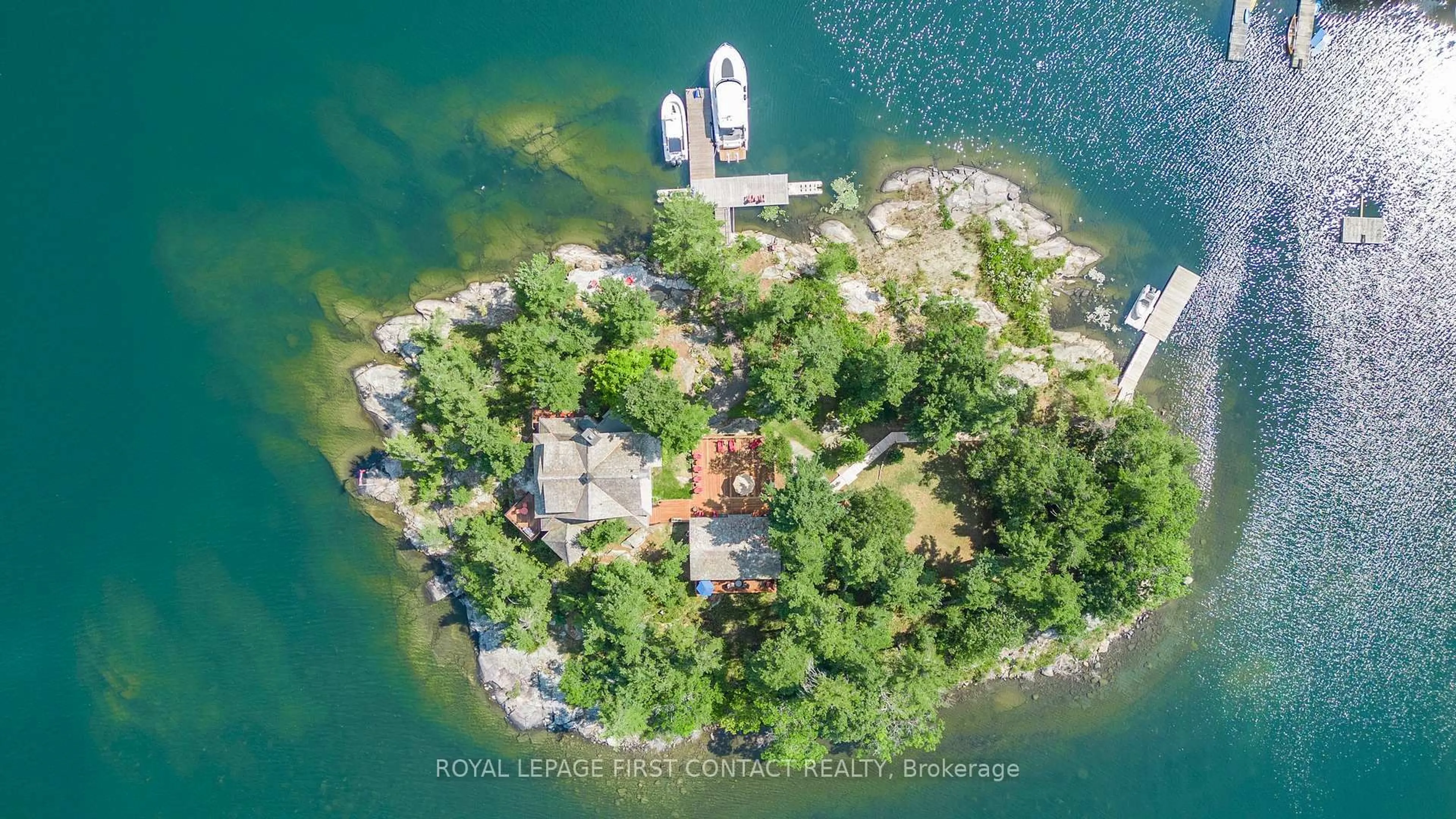 A pic from outside/outdoor area/front of a property/back of a property/a pic from drone, water/lake/river/ocean view for B-209 Lumsden Island, The Archipelago Ontario P2A 2N9