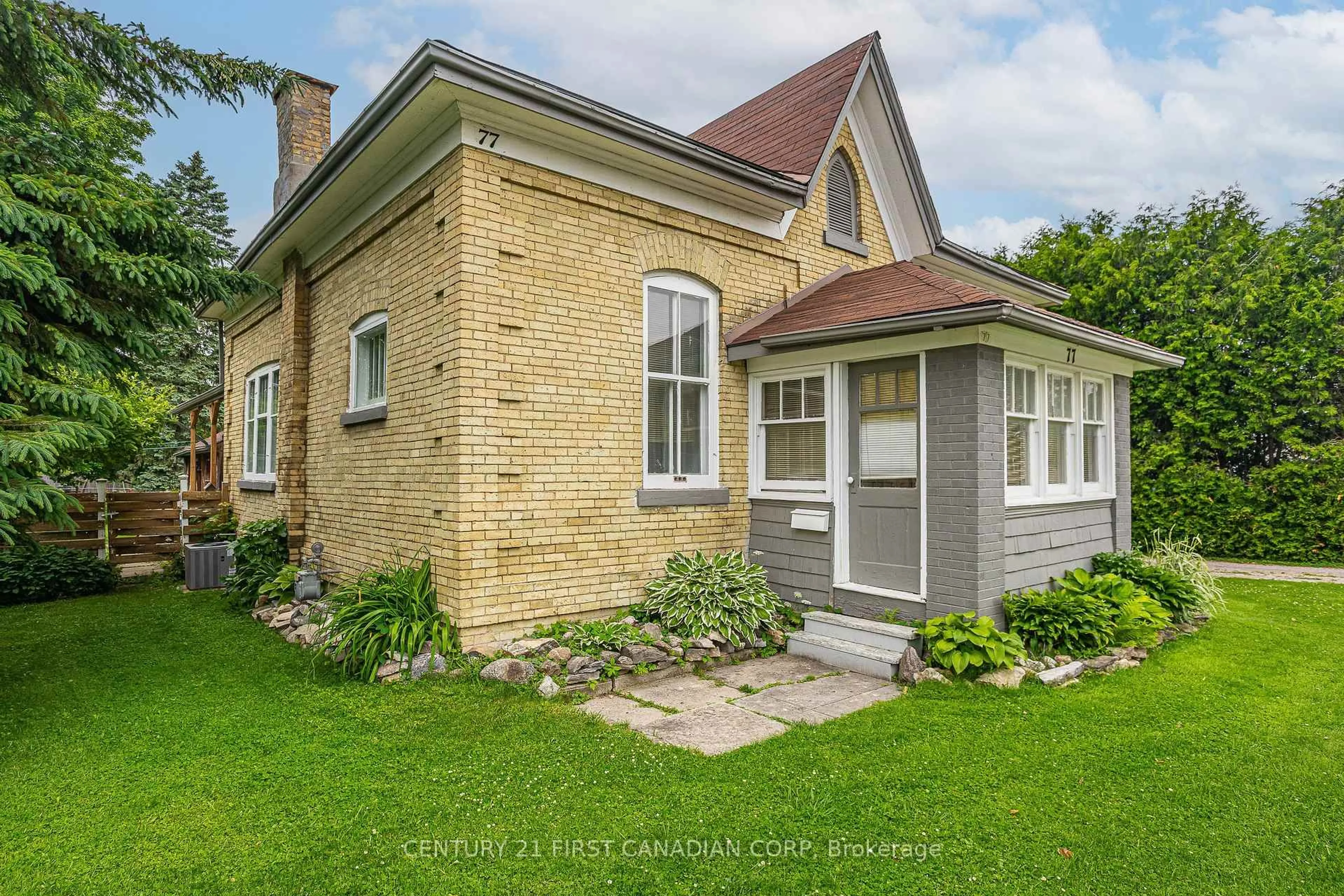 Home with brick exterior material, street for 77 Main St, South Huron Ontario N0M 1S3