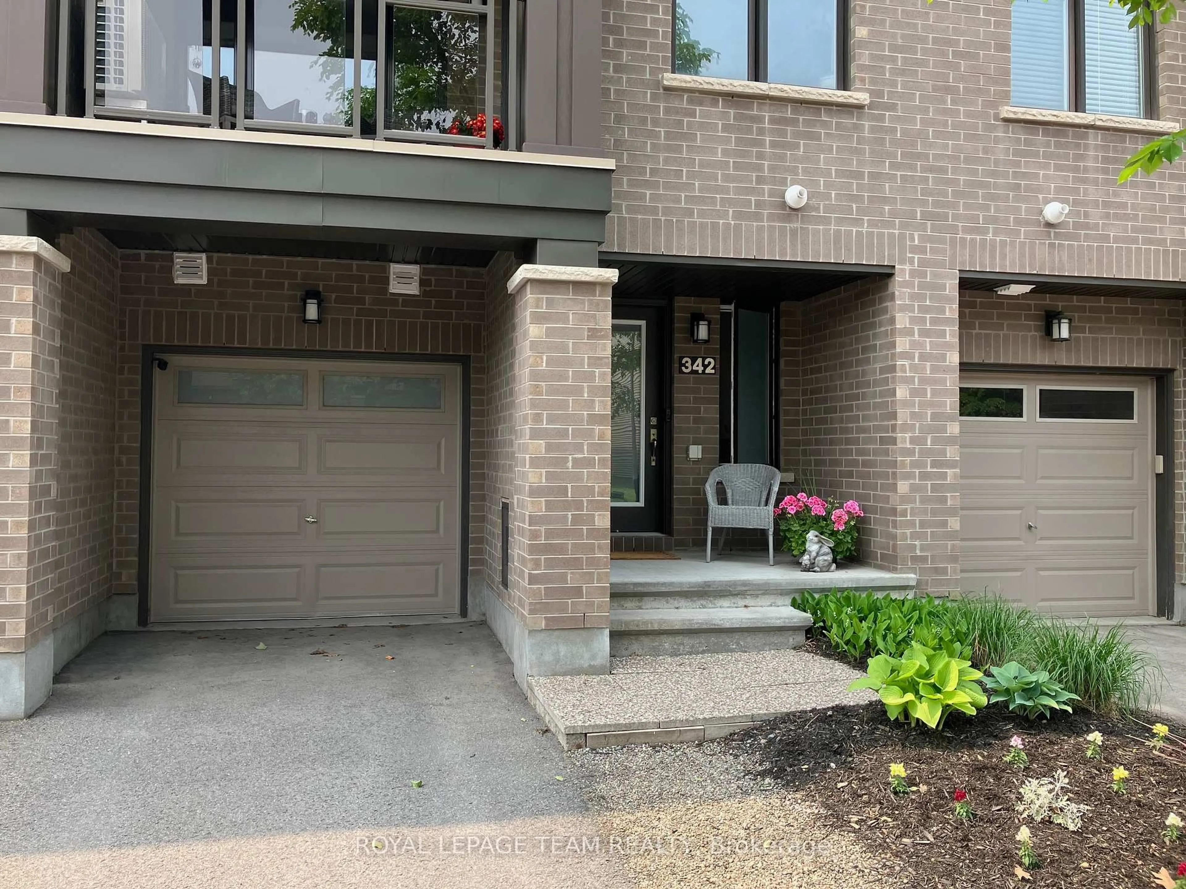 Home with brick exterior material, street for 342 Twinflower Way, Ottawa Ontario K2J 5Z6