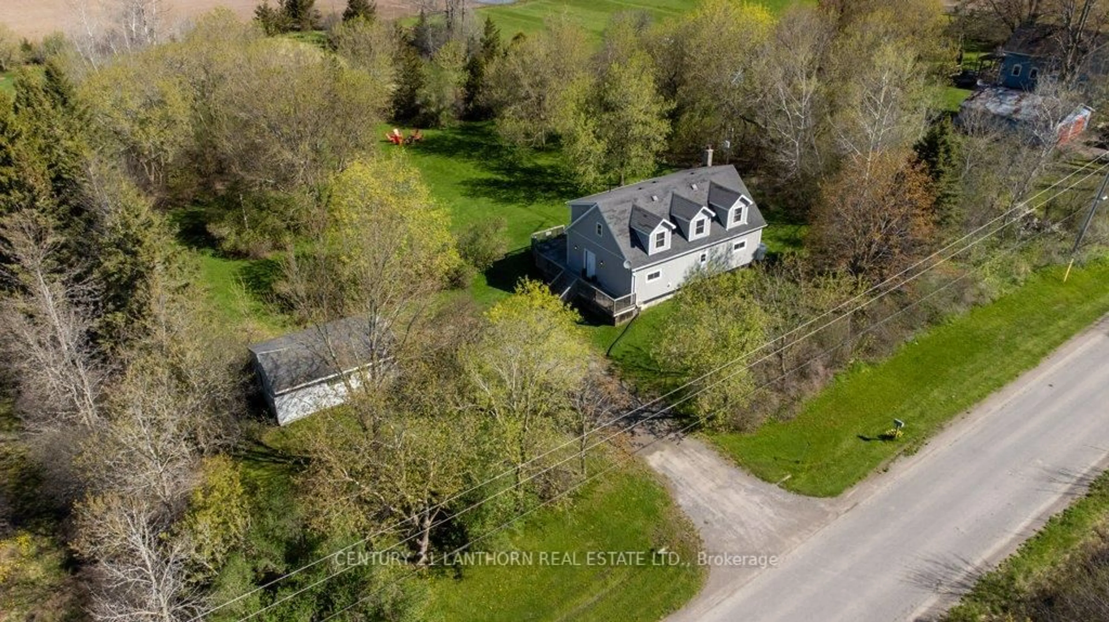 A pic from outside/outdoor area/front of a property/back of a property/a pic from drone, street for 986 Black Rd, Prince Edward County Ontario K0K 1W0