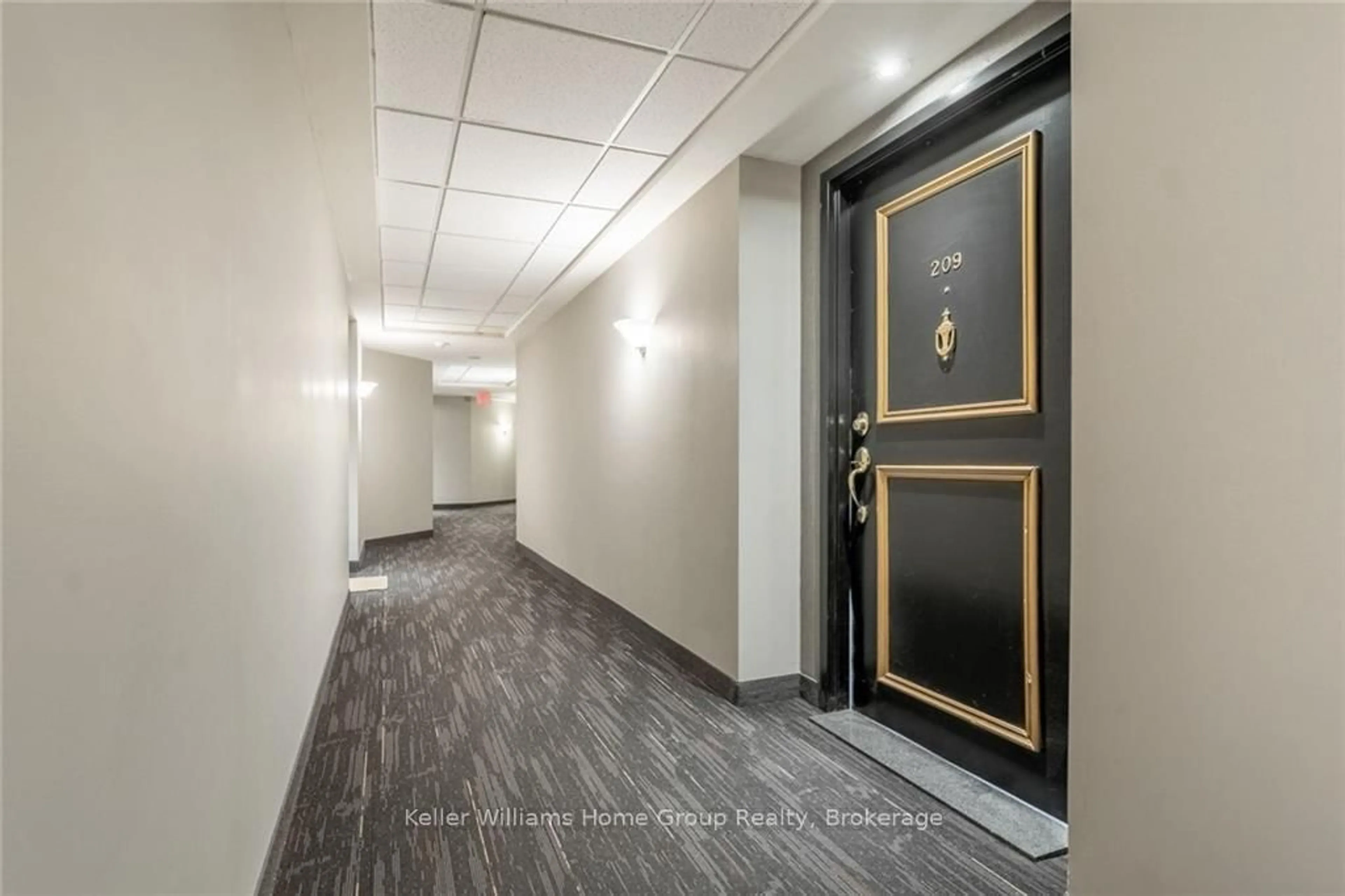 Indoor foyer for 135 James St #209, Hamilton Ontario L8P 2Z6