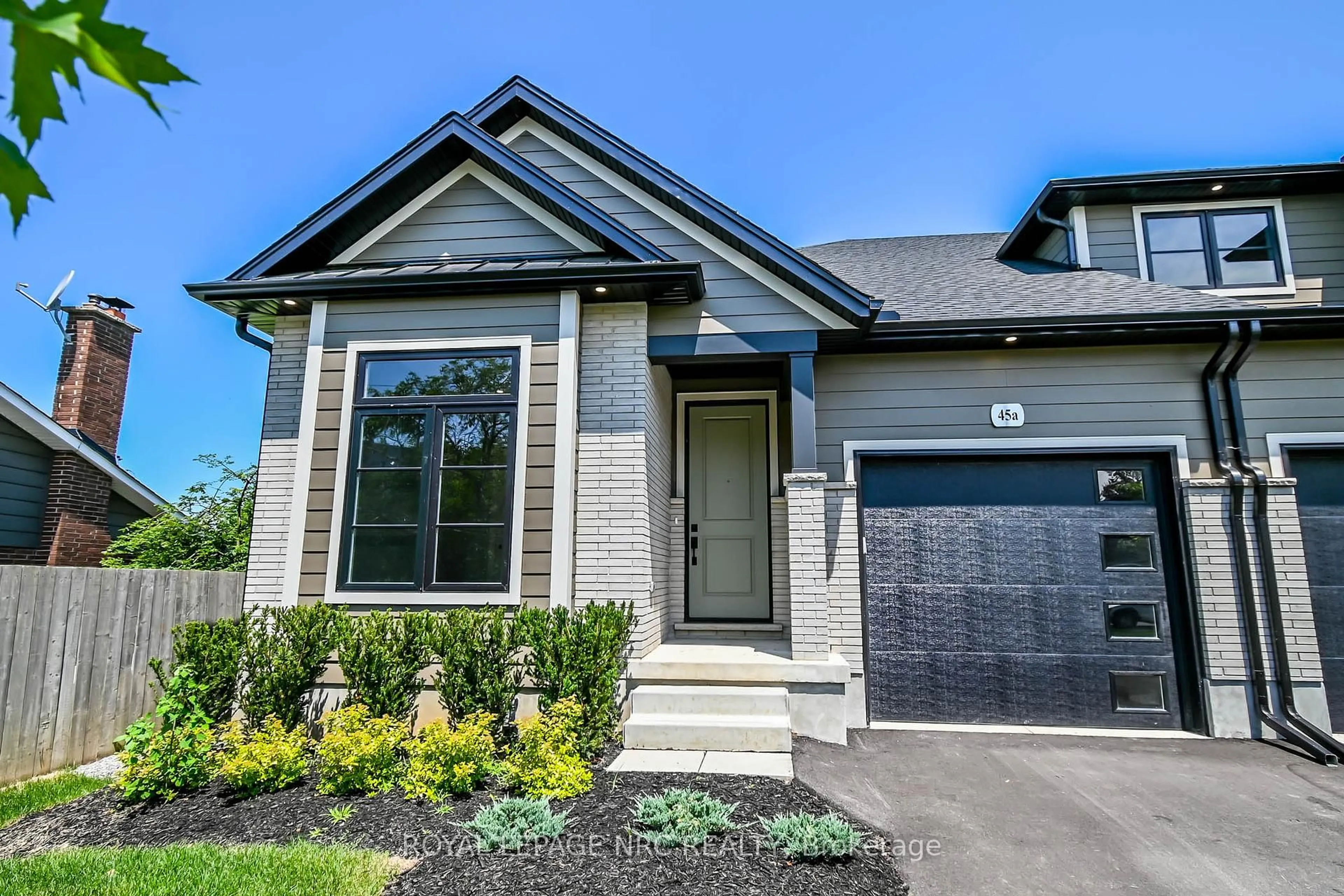Home with brick exterior material, street for 45A LAKESHORE Rd, St. Catharines Ontario L2N 2T2