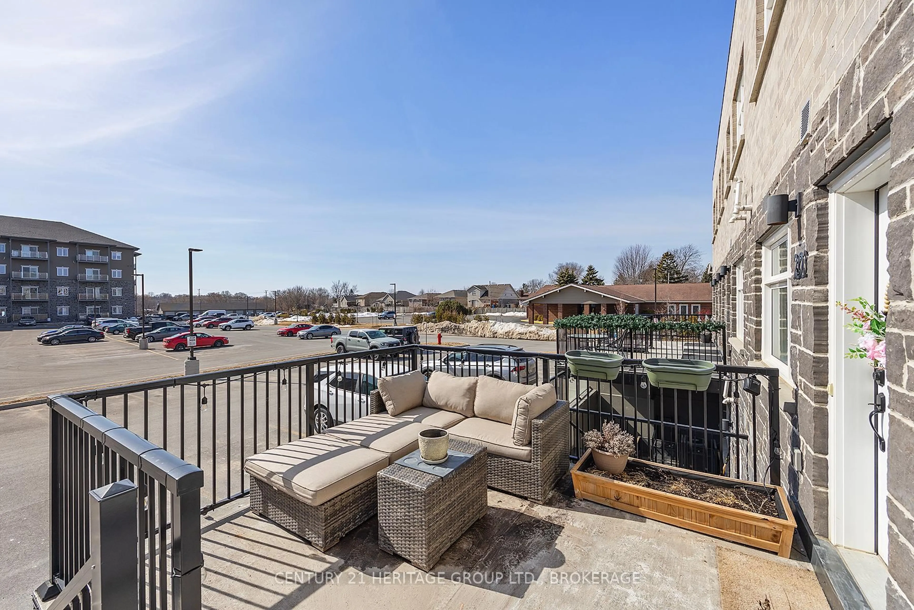 Patio, water/lake/river/ocean view for 809 Development Dr #203, Kingston Ontario K7M 0J4