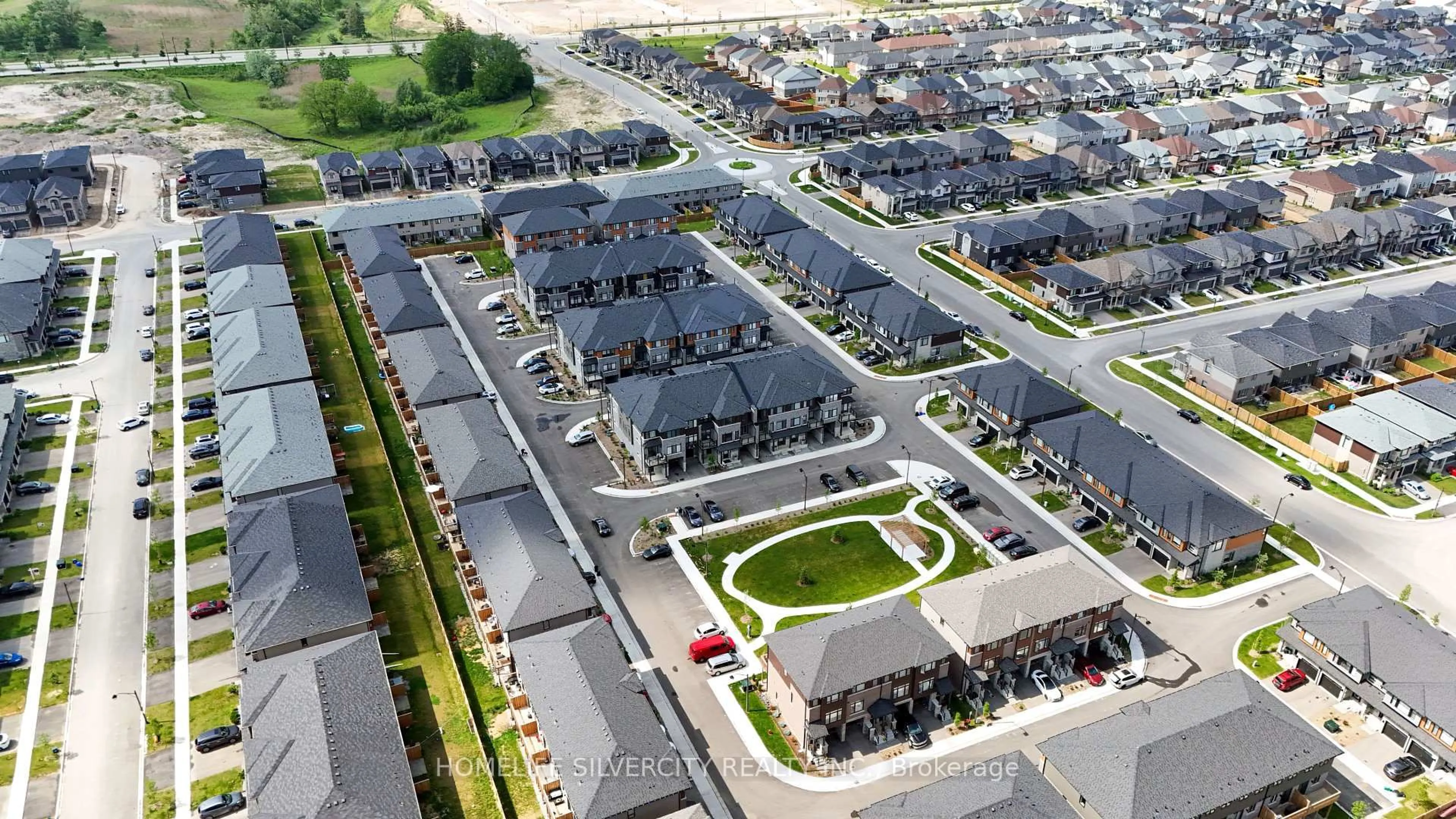 A pic from outside/outdoor area/front of a property/back of a property/a pic from drone, street for 461 Blackburn Dr #119, Brantford Ontario N3T 0W9