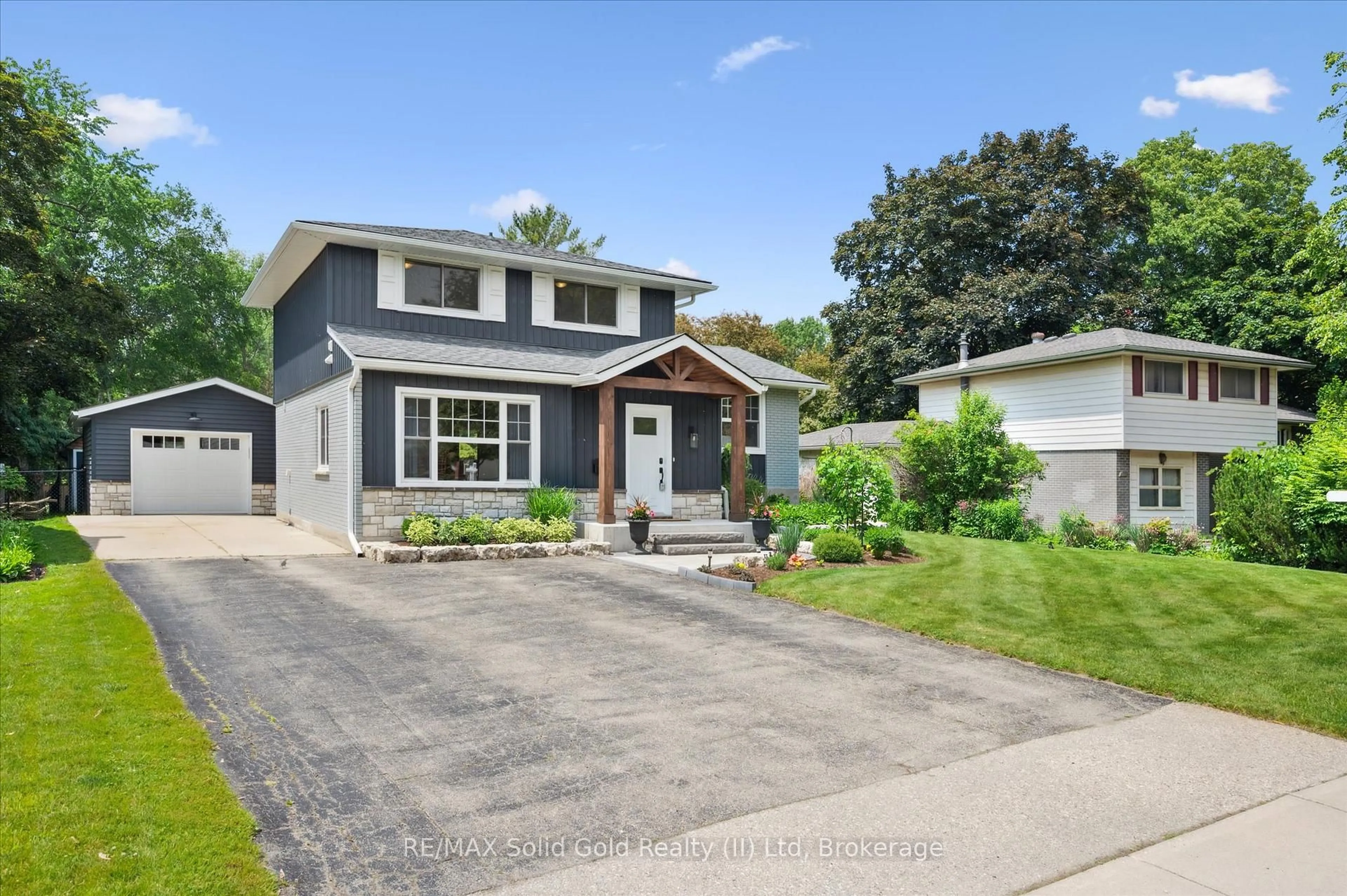 Home with brick exterior material, street for 125 Macgregor Cres, Waterloo Ontario N2J 3X2