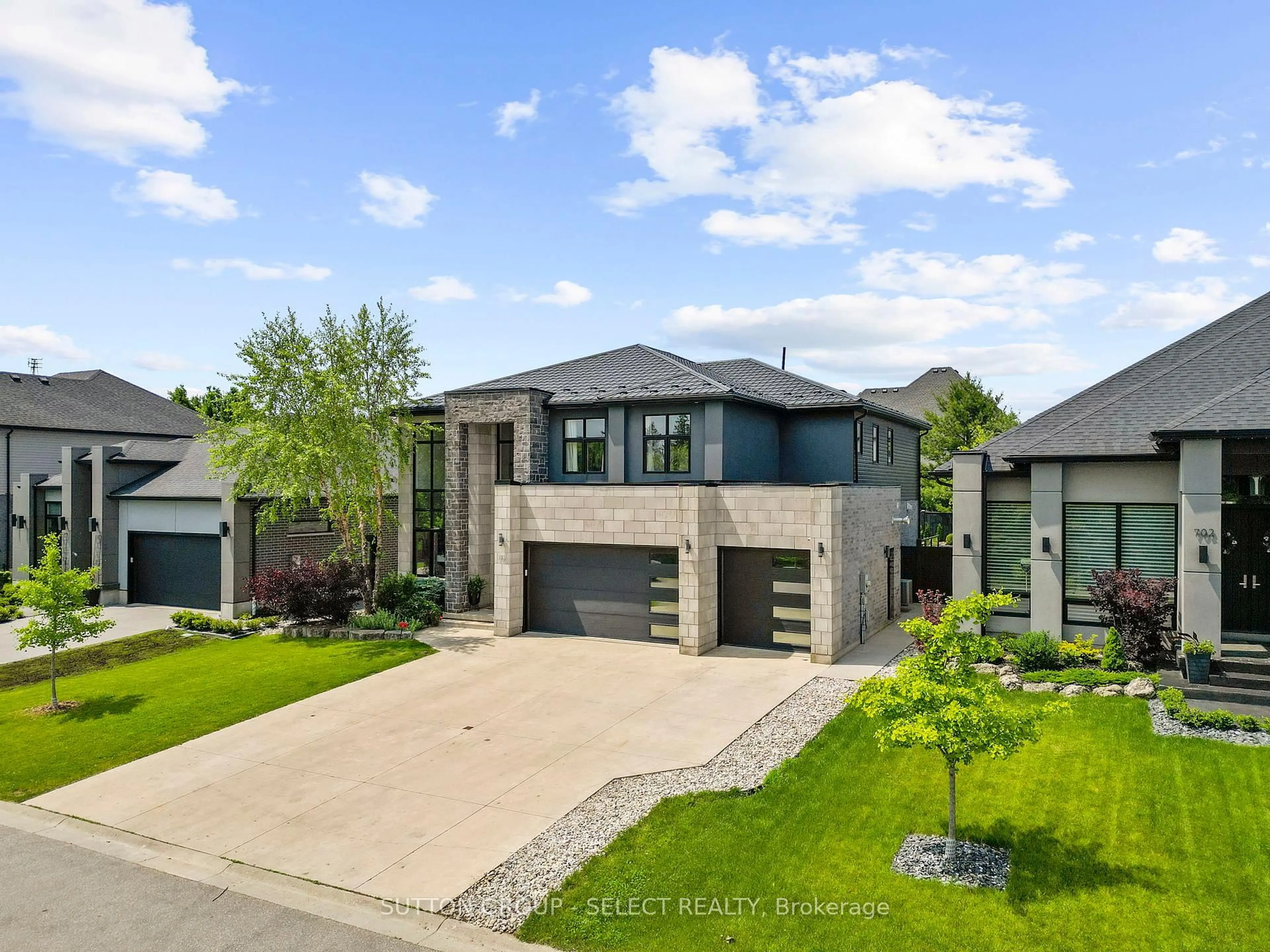 Home with brick exterior material, street for 710 Hickoryridge Common, London North Ontario N6G 0M8