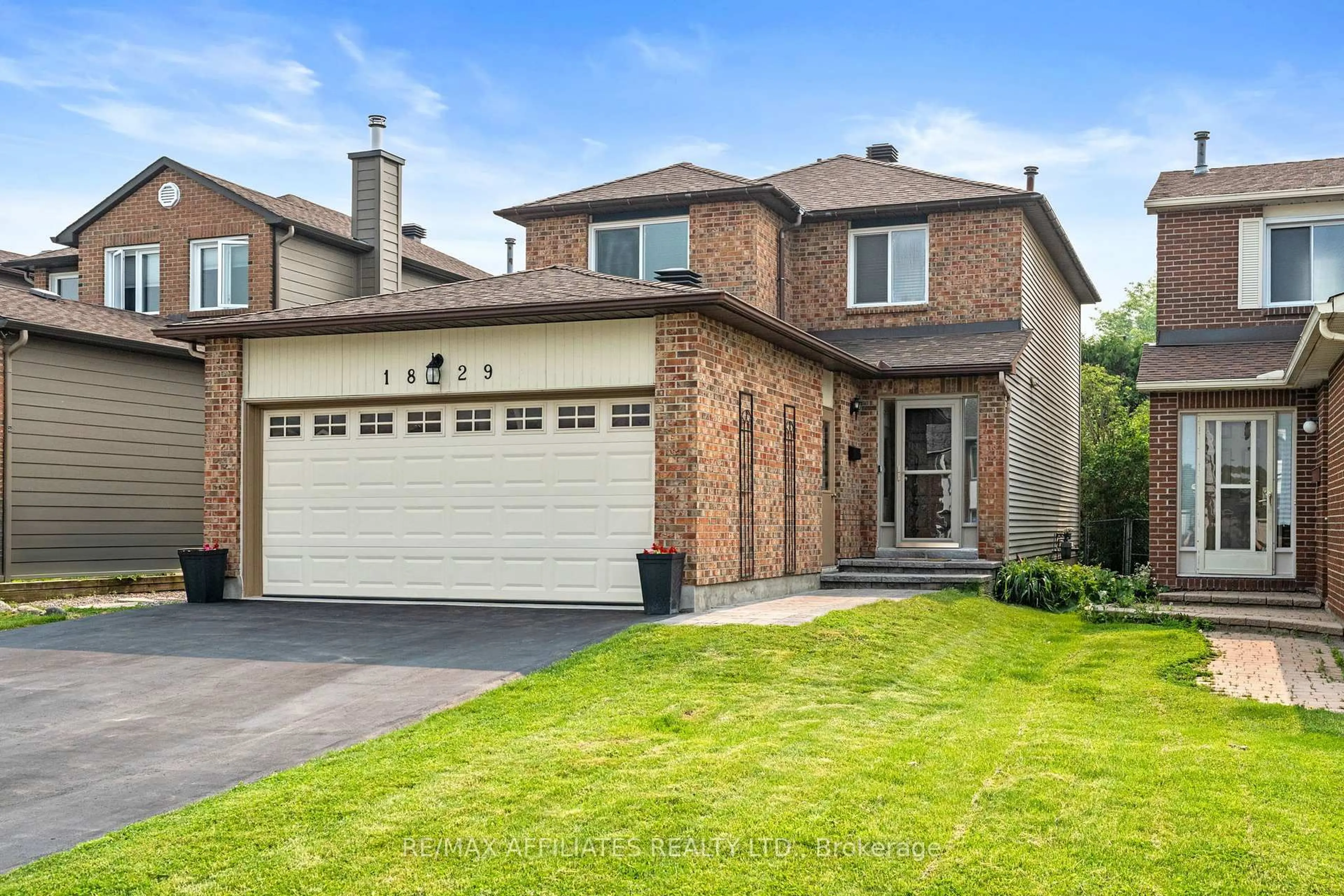 Home with brick exterior material, street for 1829 Chaine Crt, Orleans Ontario K1C 2W6