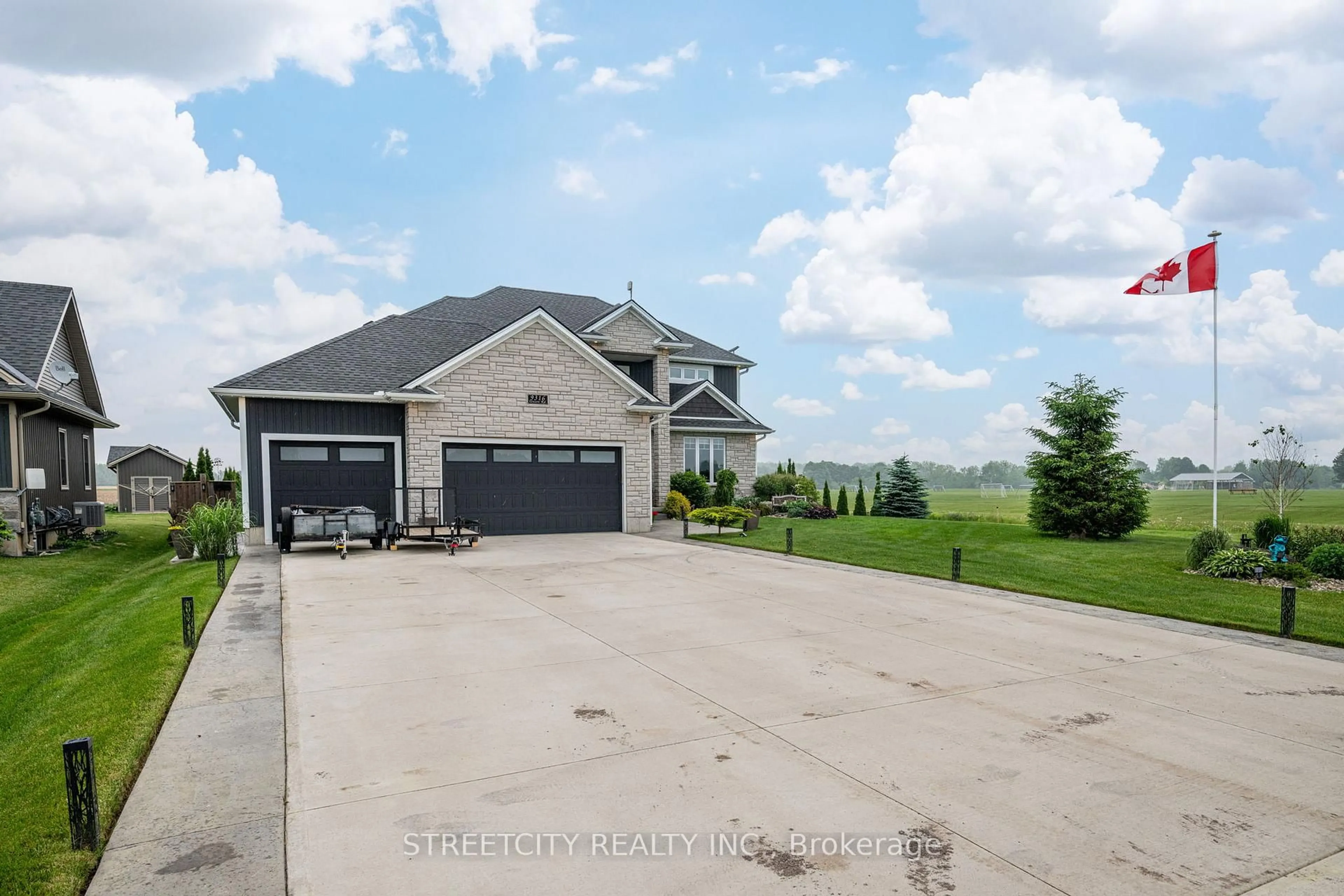 A pic from outside/outdoor area/front of a property/back of a property/a pic from drone, water/lake/river/ocean view for 9316 Union Rd, Southwold Ontario N0L 2E0