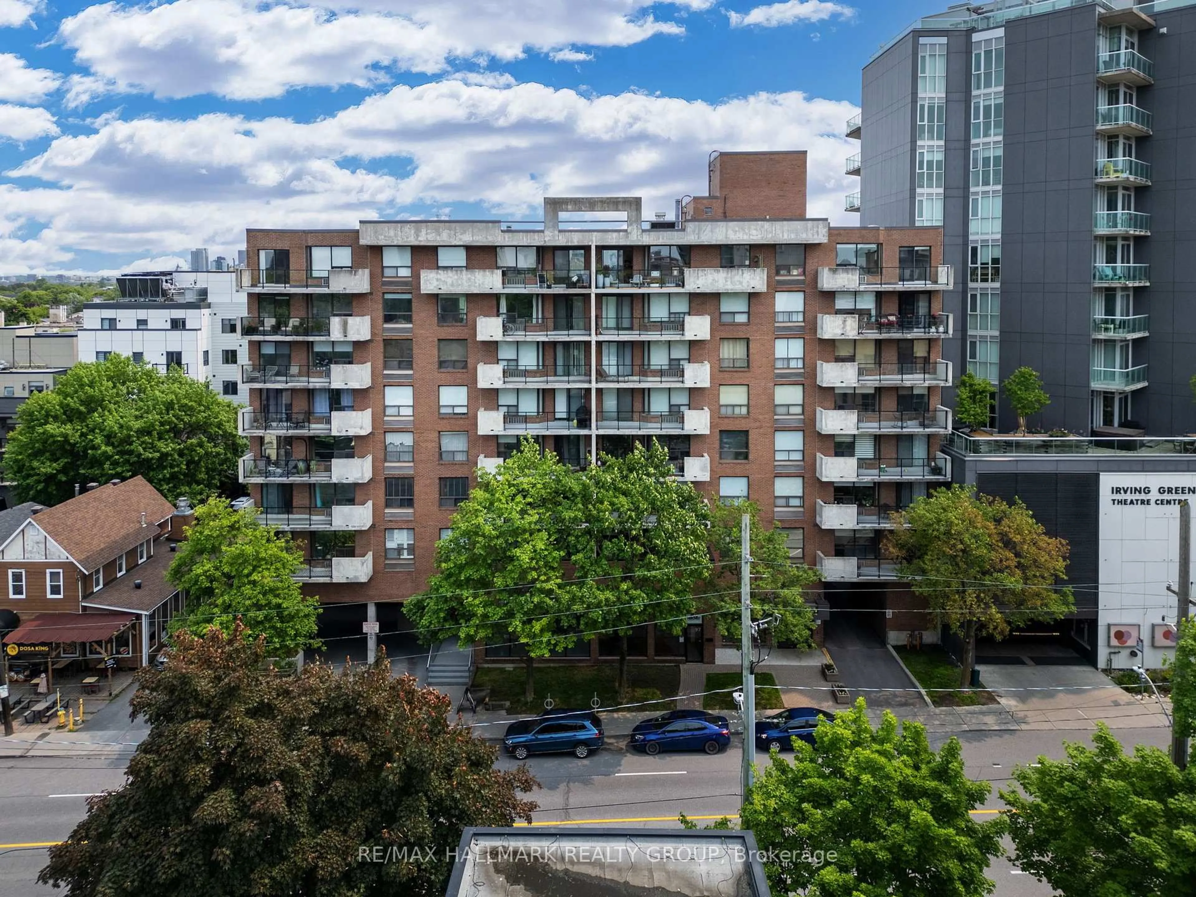 A pic from outside/outdoor area/front of a property/back of a property/a pic from drone, city buildings view from balcony for 99 Holland Ave #301, Ottawa Ontario K1Y 0Y1