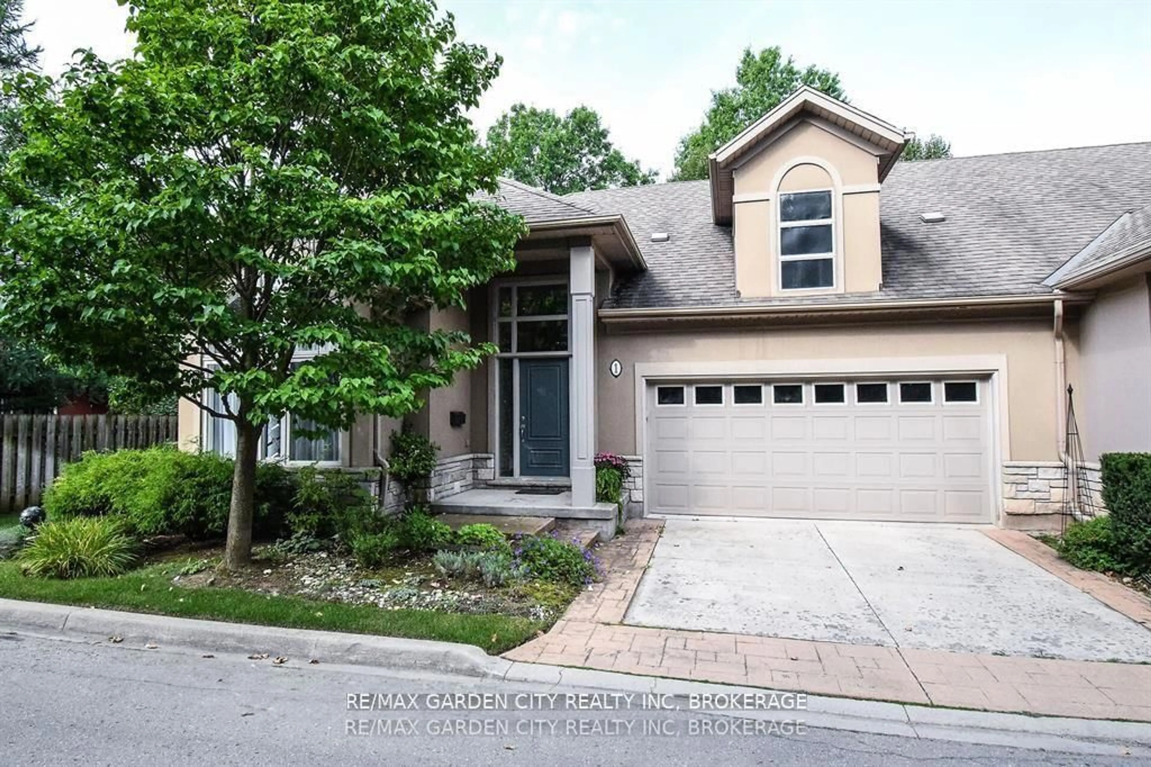 Home with brick exterior material, street for 165 Glendale Ave #1, St. Catharines Ontario L2T 2K2