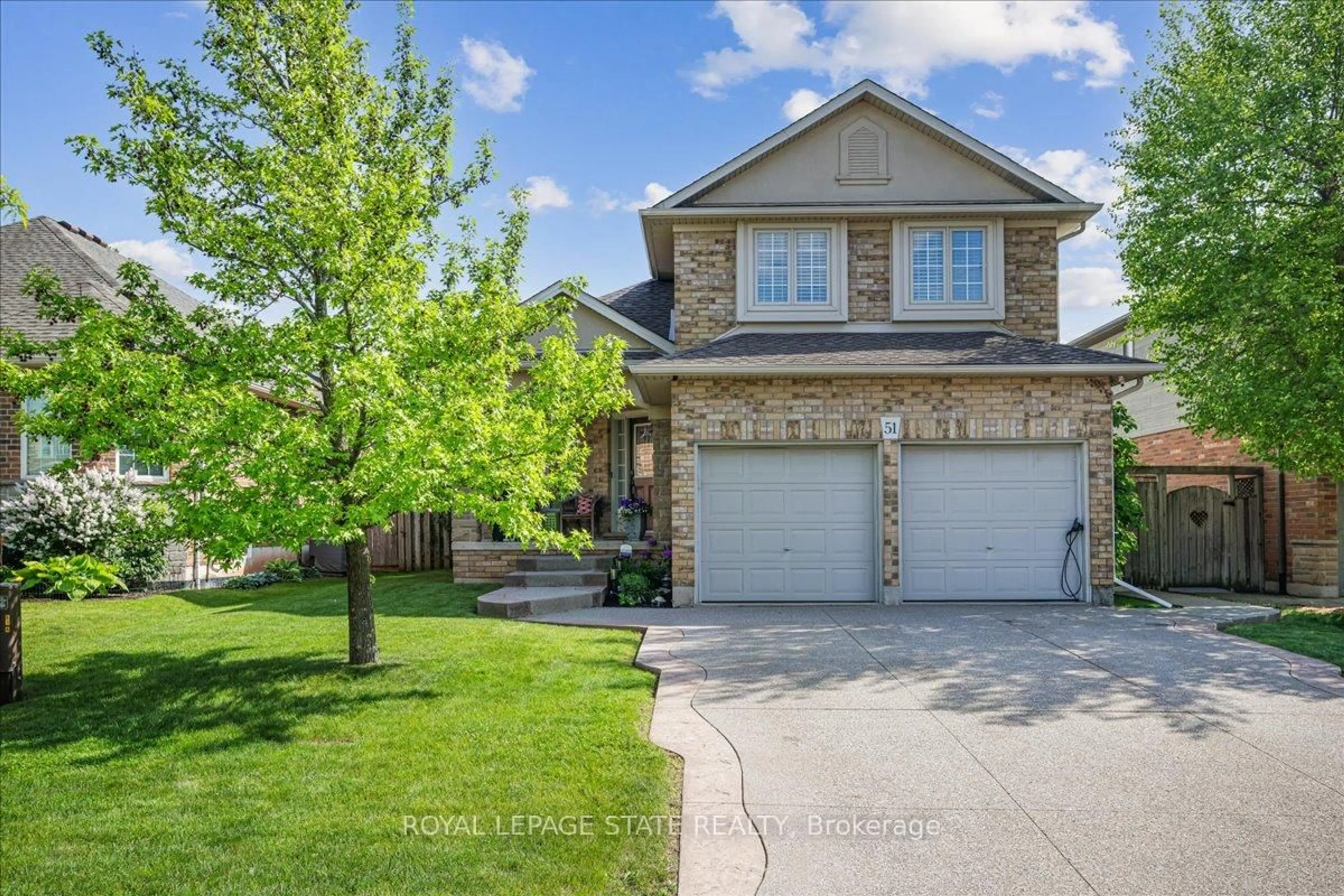 Home with brick exterior material, street for 51 Napa Lane, Hamilton Ontario L8E 6B7