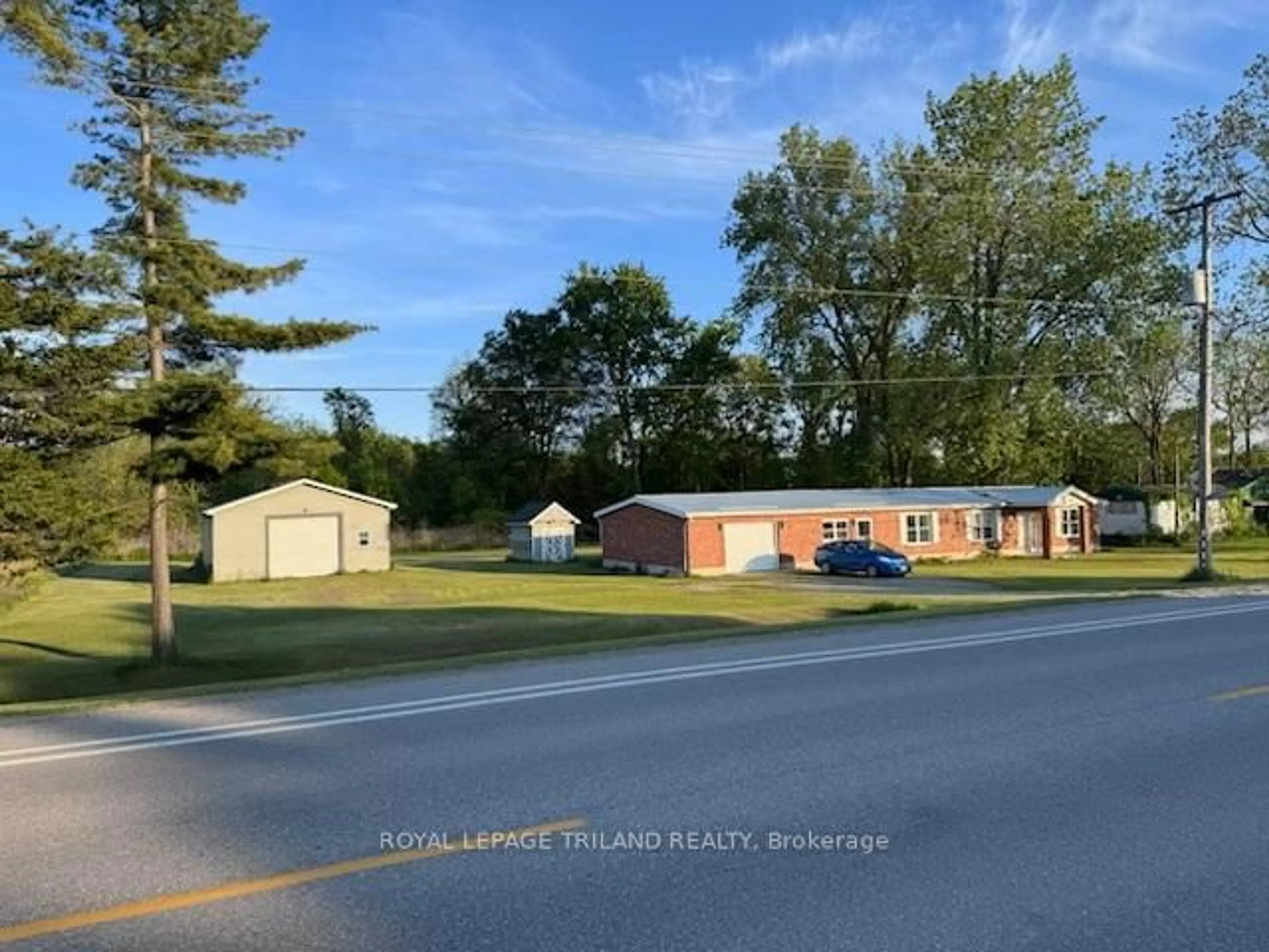 A pic from outside/outdoor area/front of a property/back of a property/a pic from drone, street for 24353 PIONEER Line, West Elgin Ontario N0L 2P0