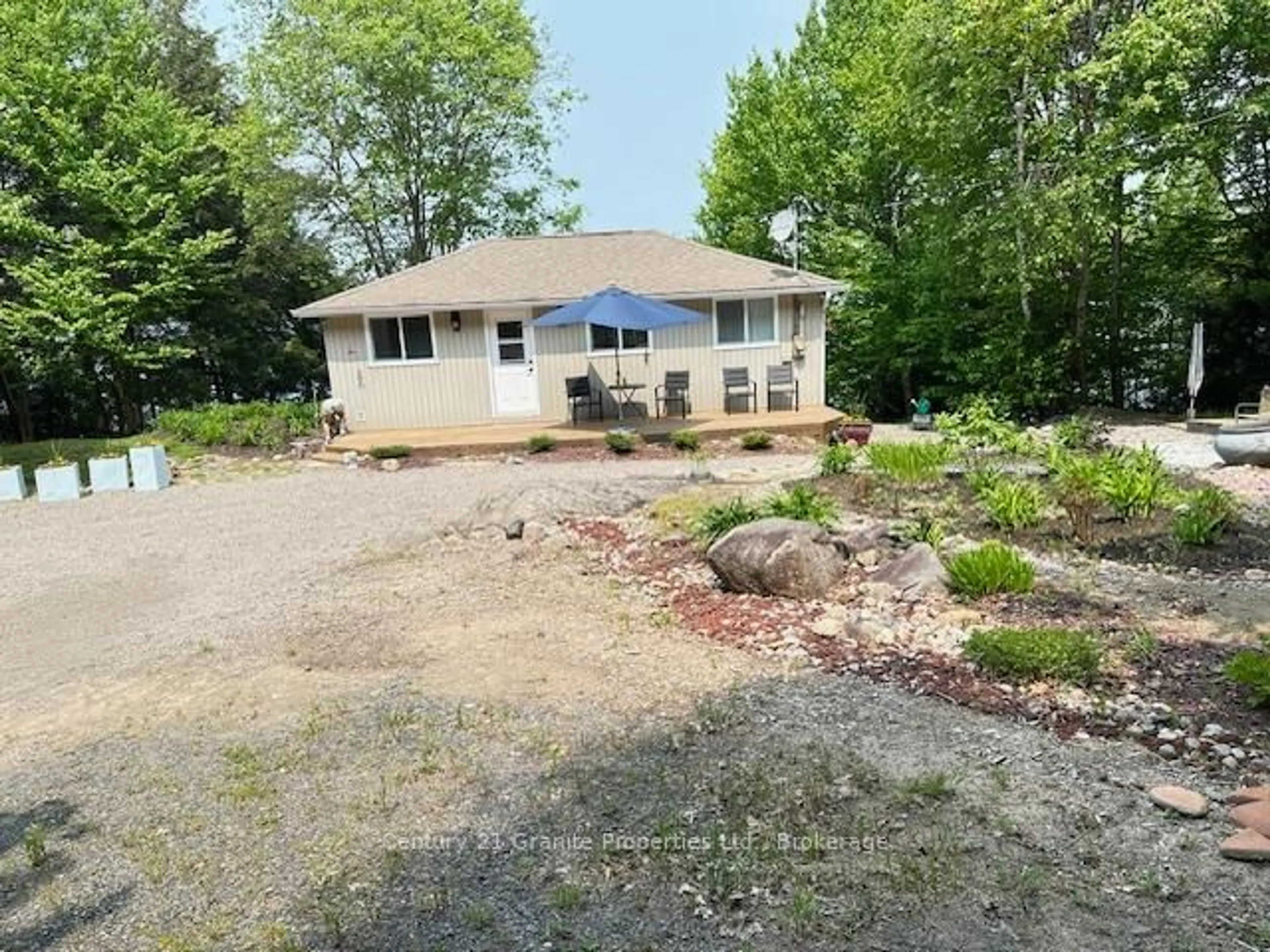 A pic from outside/outdoor area/front of a property/back of a property/a pic from drone, water/lake/river/ocean view for 4 Turtle Lane, McKellar Ontario P2A 0B4