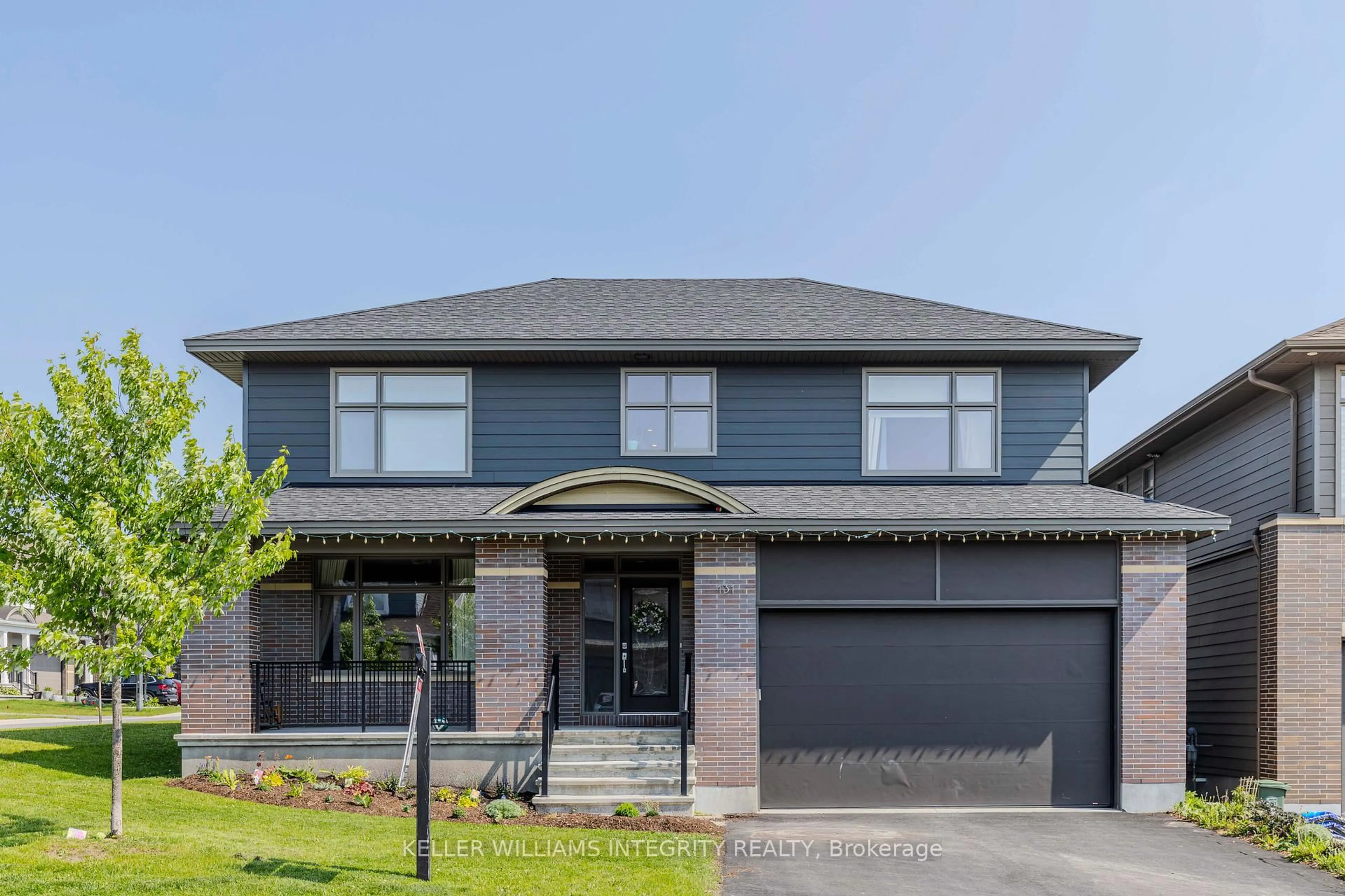 Home with brick exterior material, street for 131 Escarpment Cres, Ottawa Ontario K2T 0L8