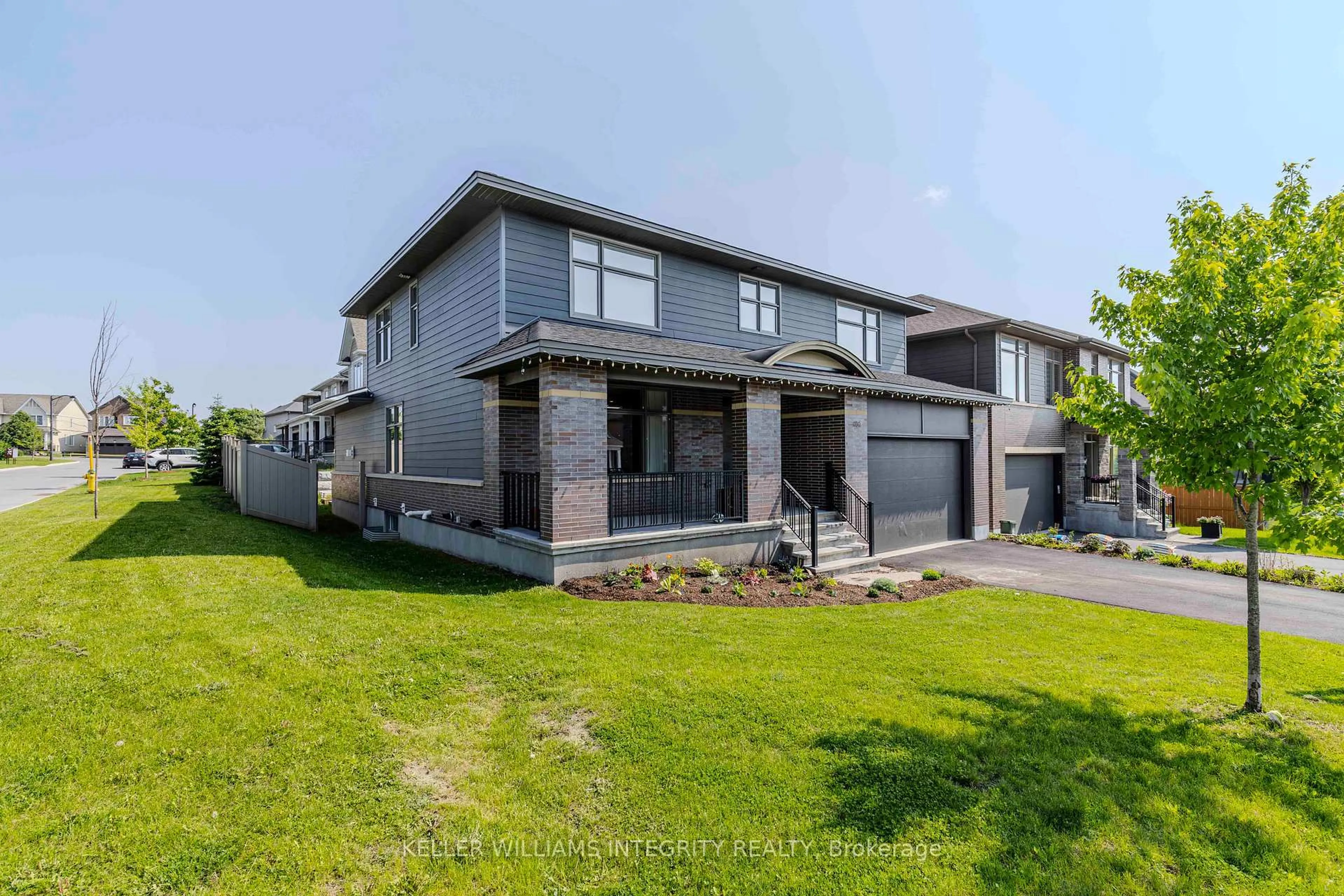 Home with brick exterior material, street for 131 Escarpment Cres, Ottawa Ontario K2T 0L8