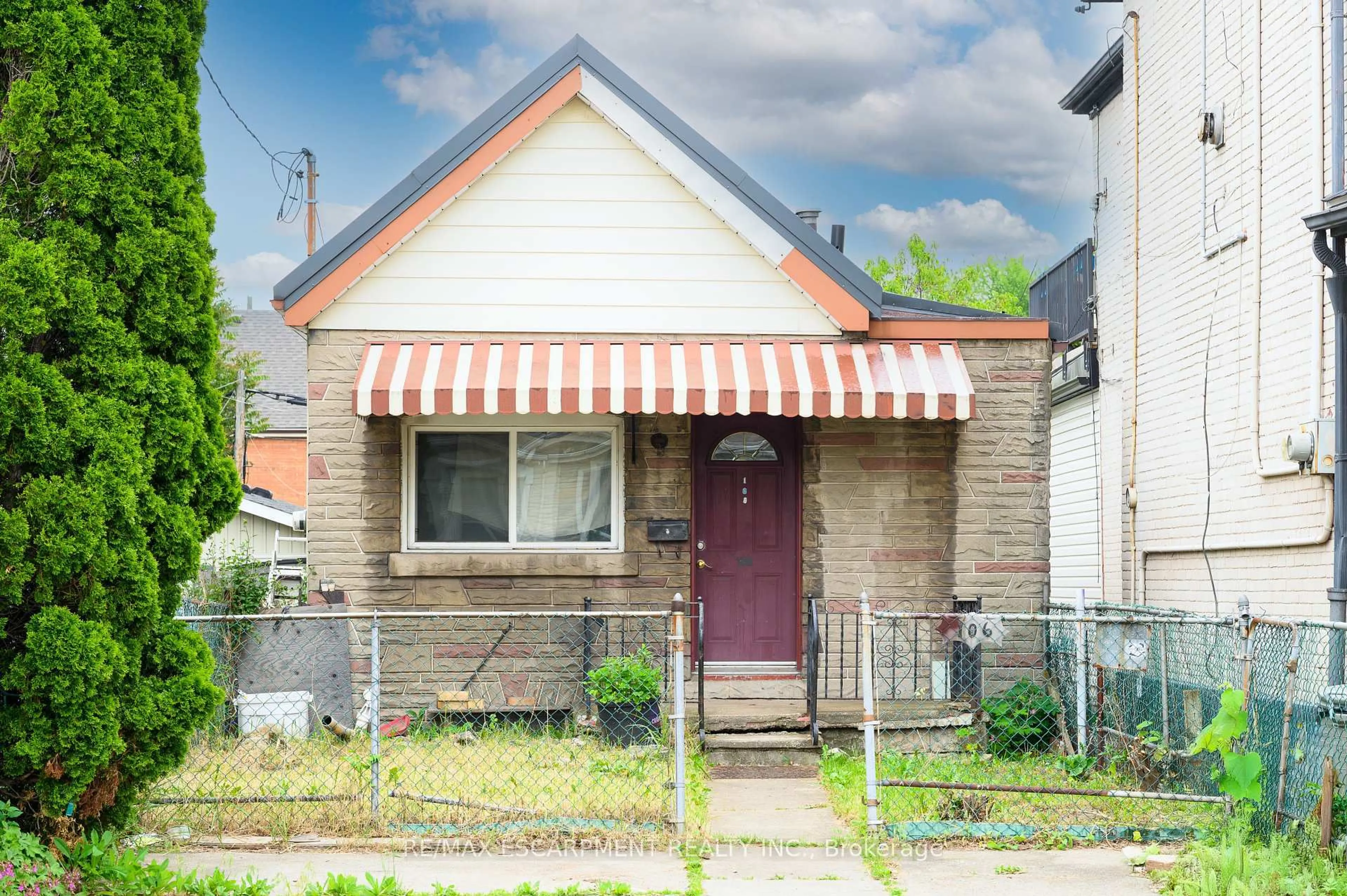 Home with brick exterior material, street for 106 Emerald St, Hamilton Ontario L8L 5K4