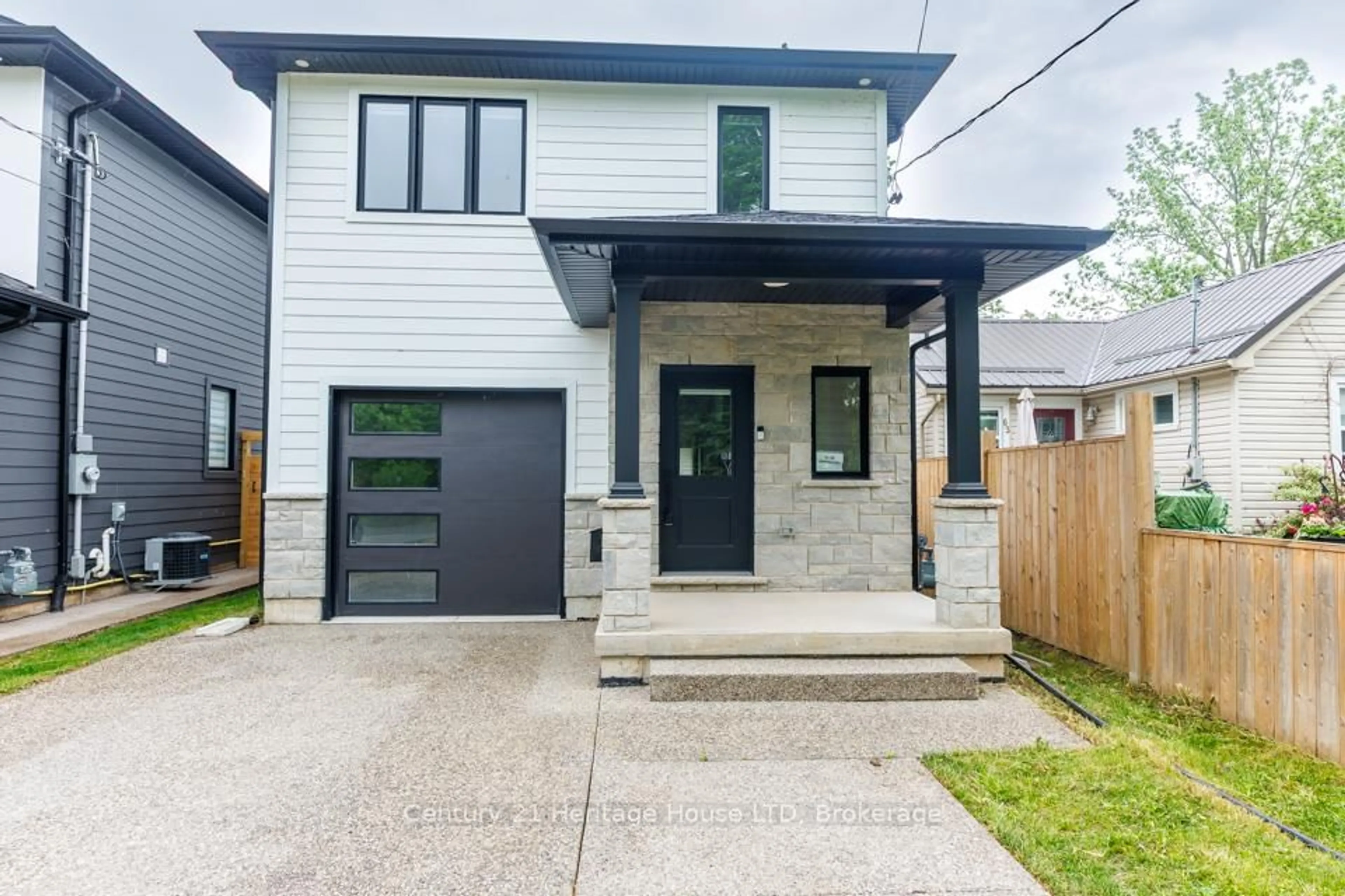 Home with brick exterior material, street for 61.5B Jarrow Rd, St. Catharines Ontario L2M 1B7