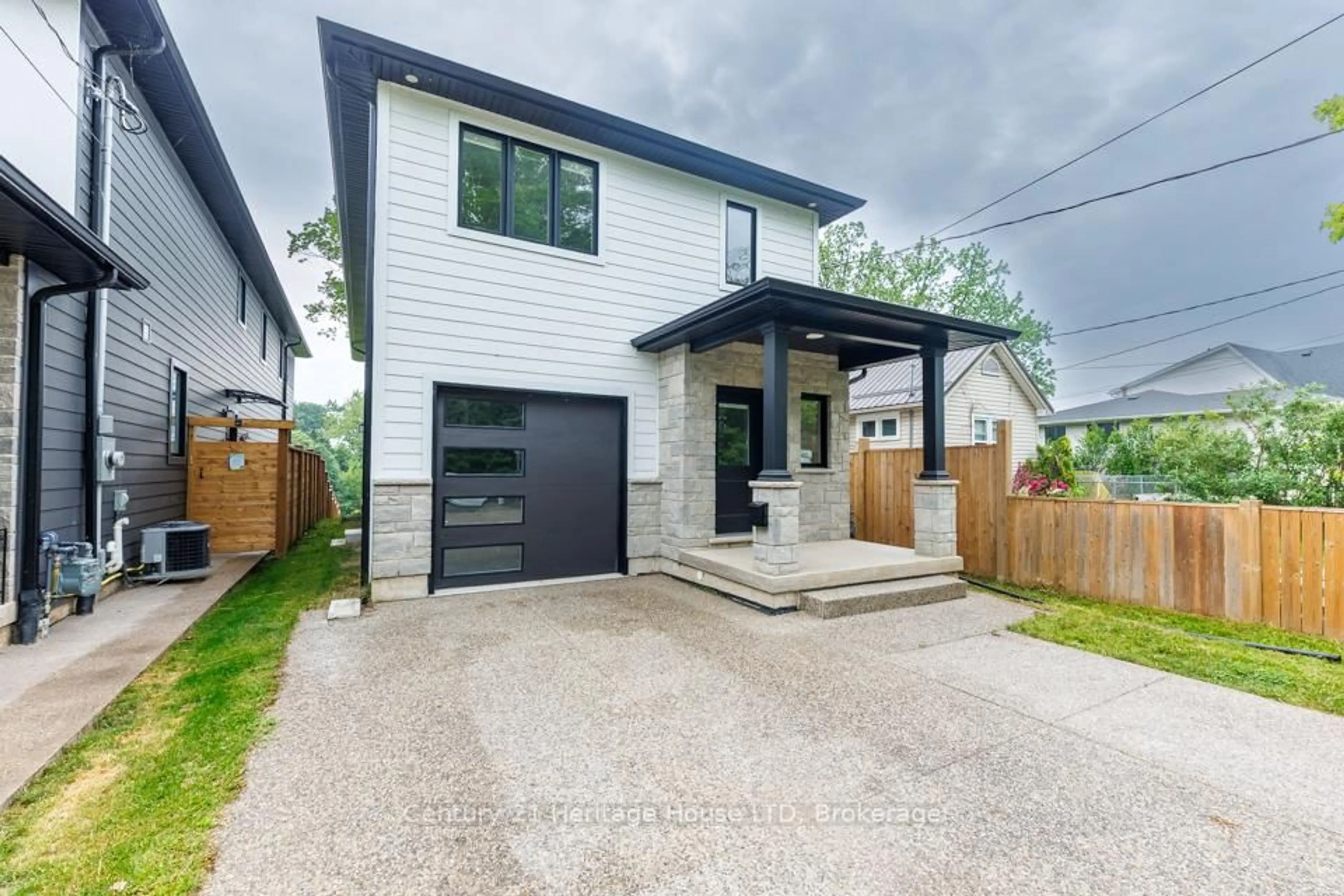 Home with brick exterior material, street for 61.5B Jarrow Rd, St. Catharines Ontario L2M 1B7