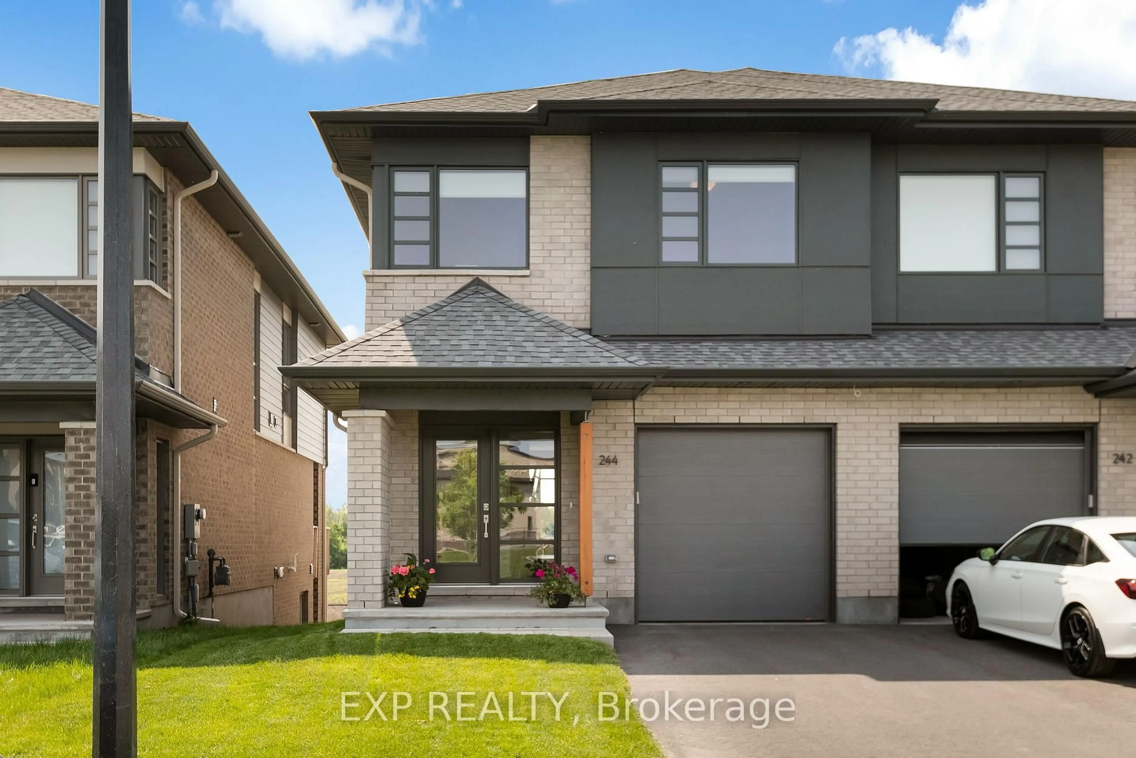 Home with vinyl exterior material, street for 244 Shuttleworth Dr, Ottawa Ontario K1T 0T4