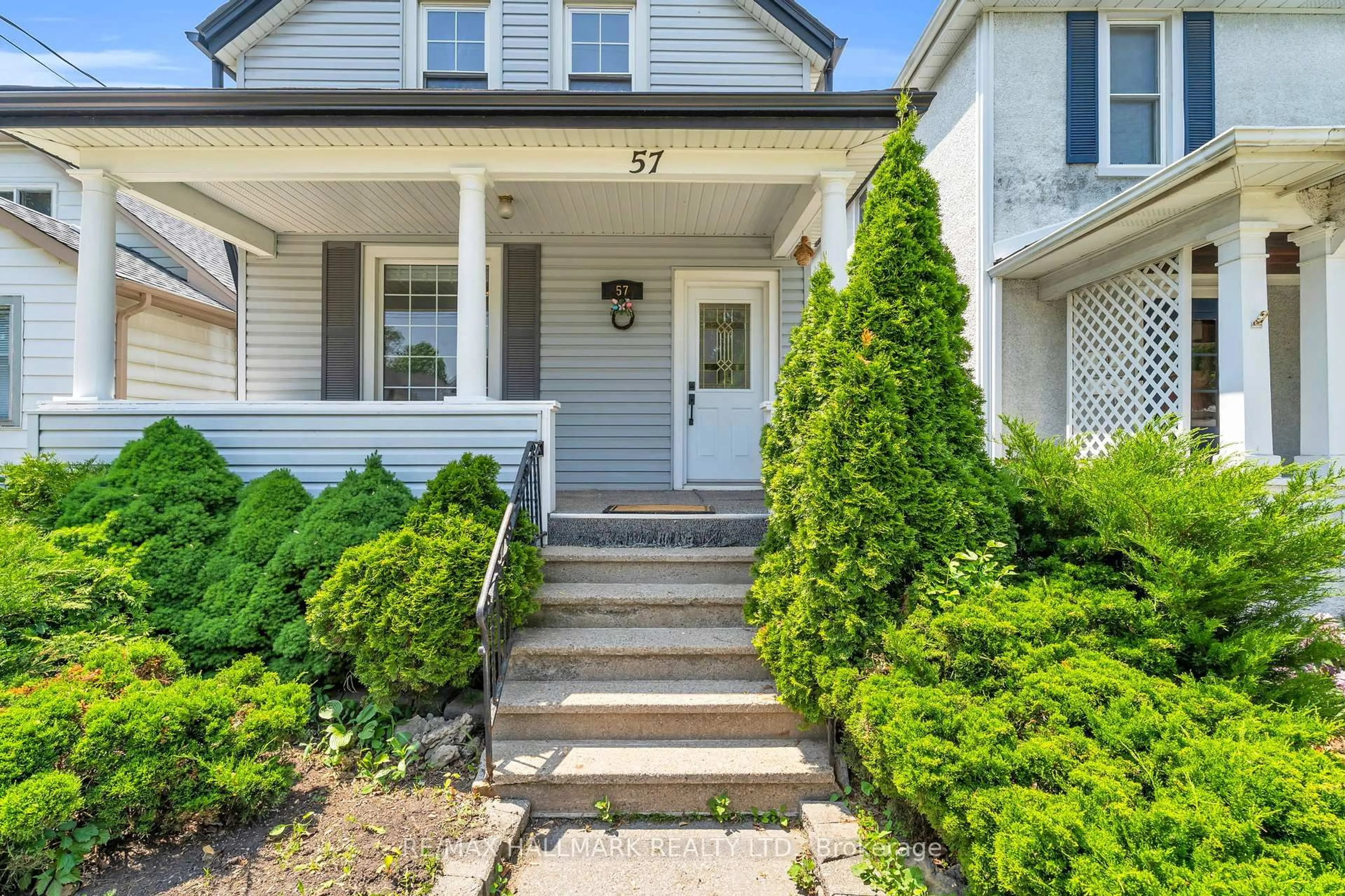 Home with vinyl exterior material, street for 57 Henry St, St. Catharines Ontario L2R 5T7
