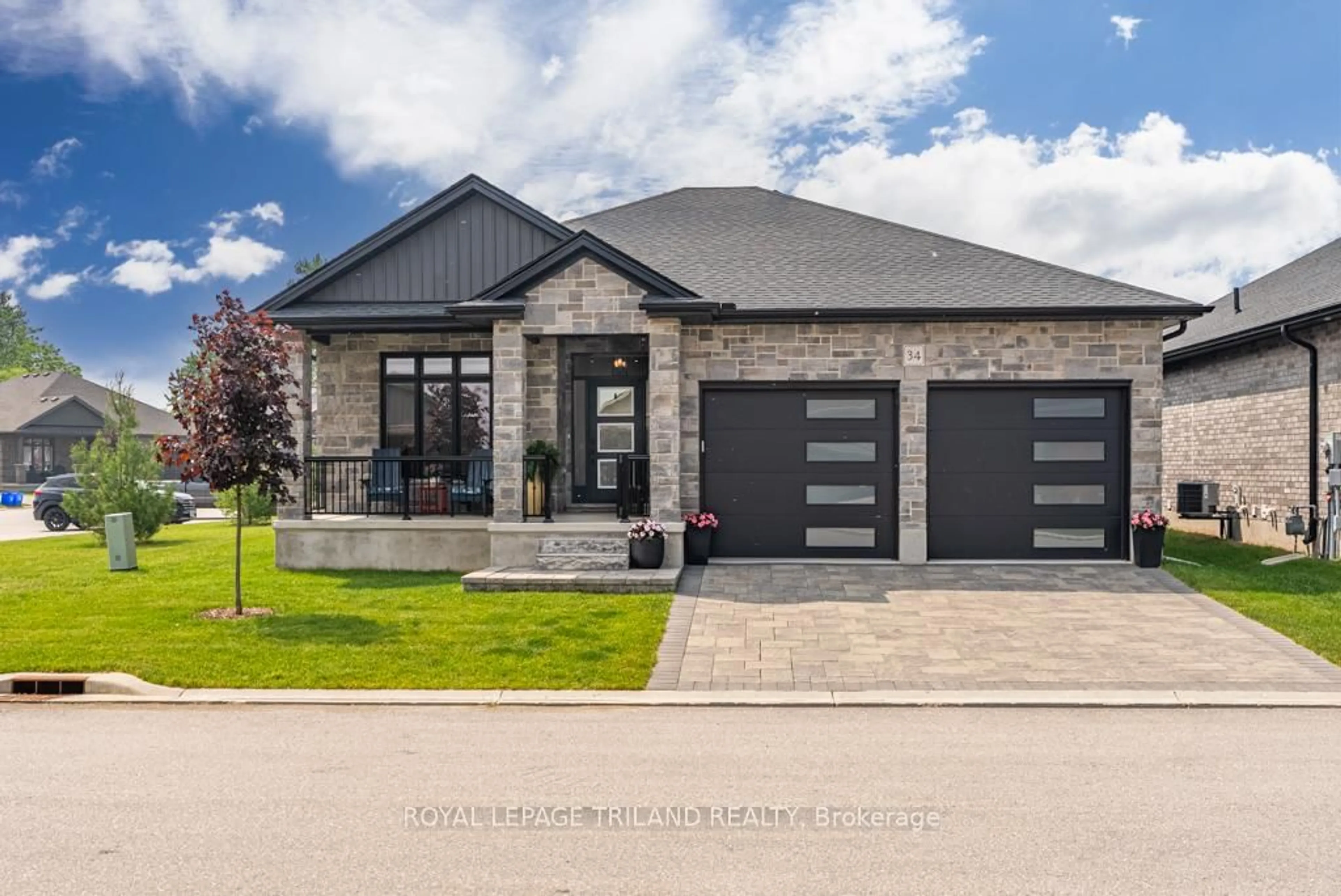 Home with brick exterior material, street for 121 ROBIN Rdge #34, Central Elgin Ontario N0L 1B0