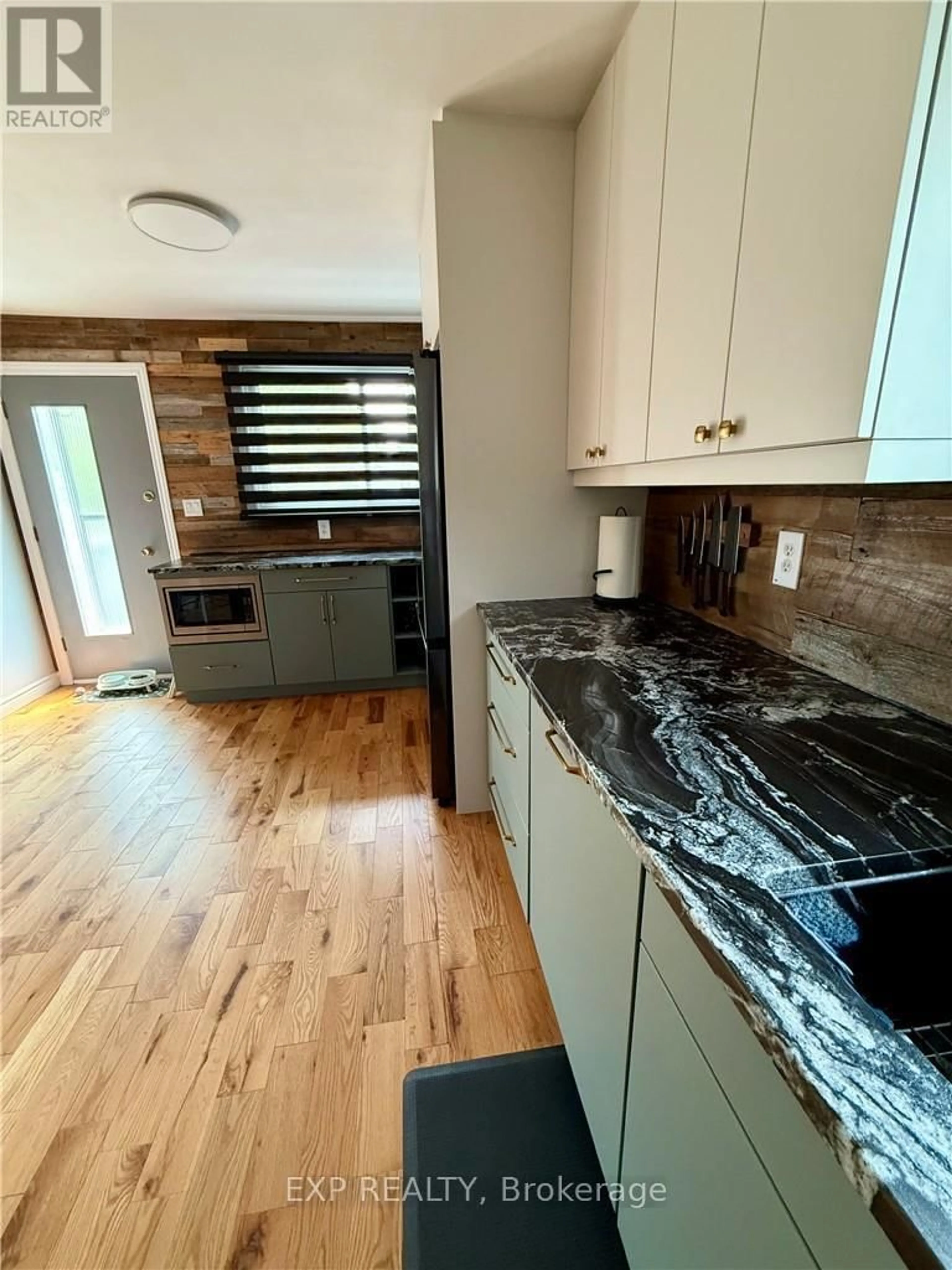 Open concept kitchen, unknown for 3135 Louis St, Greater Sudbury Ontario P3N 1B9