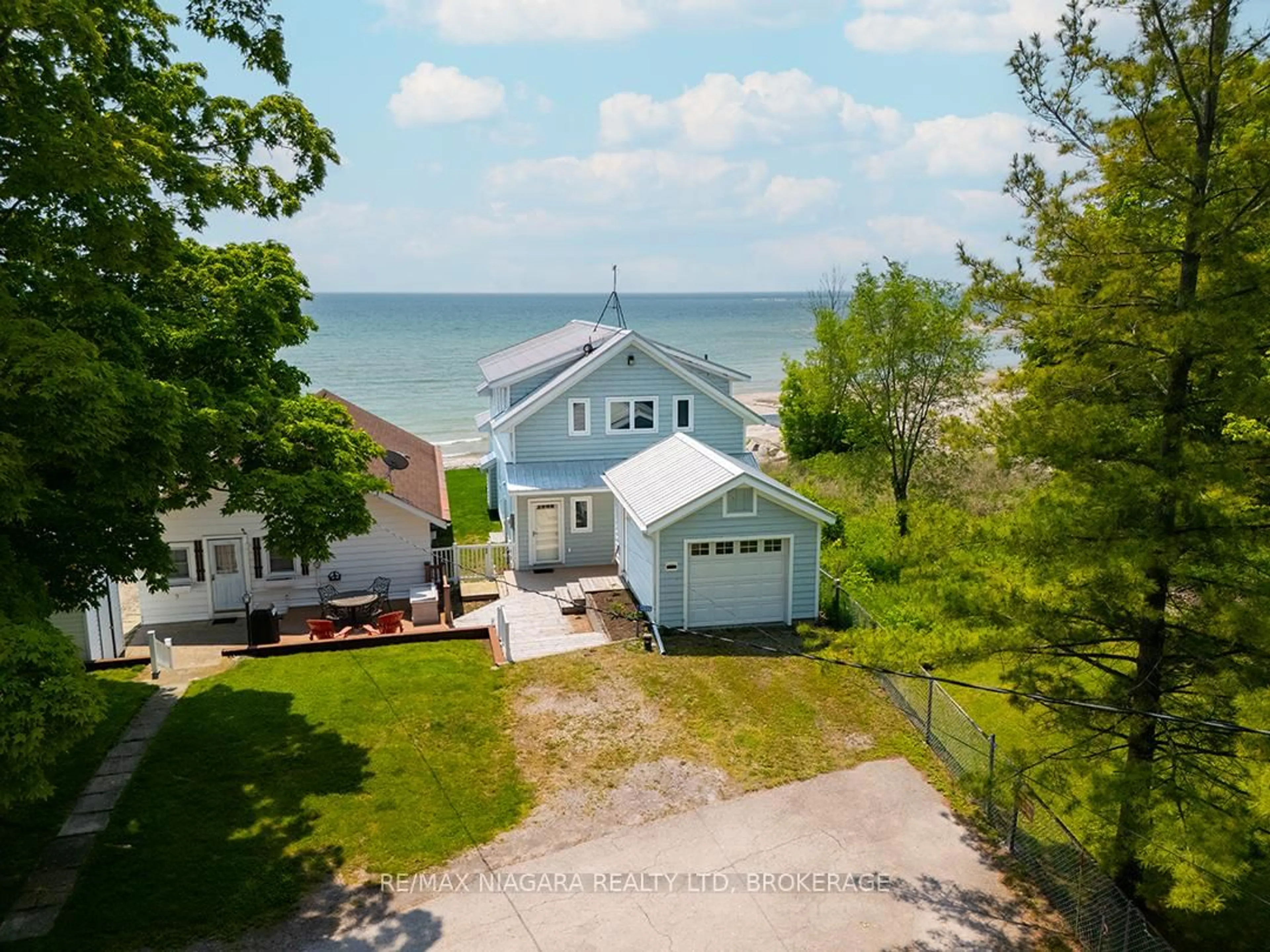A pic from outside/outdoor area/front of a property/back of a property/a pic from drone, water/lake/river/ocean view for 12895 Old Lakeshore Rd, Wainfleet Ontario L0S 1V0