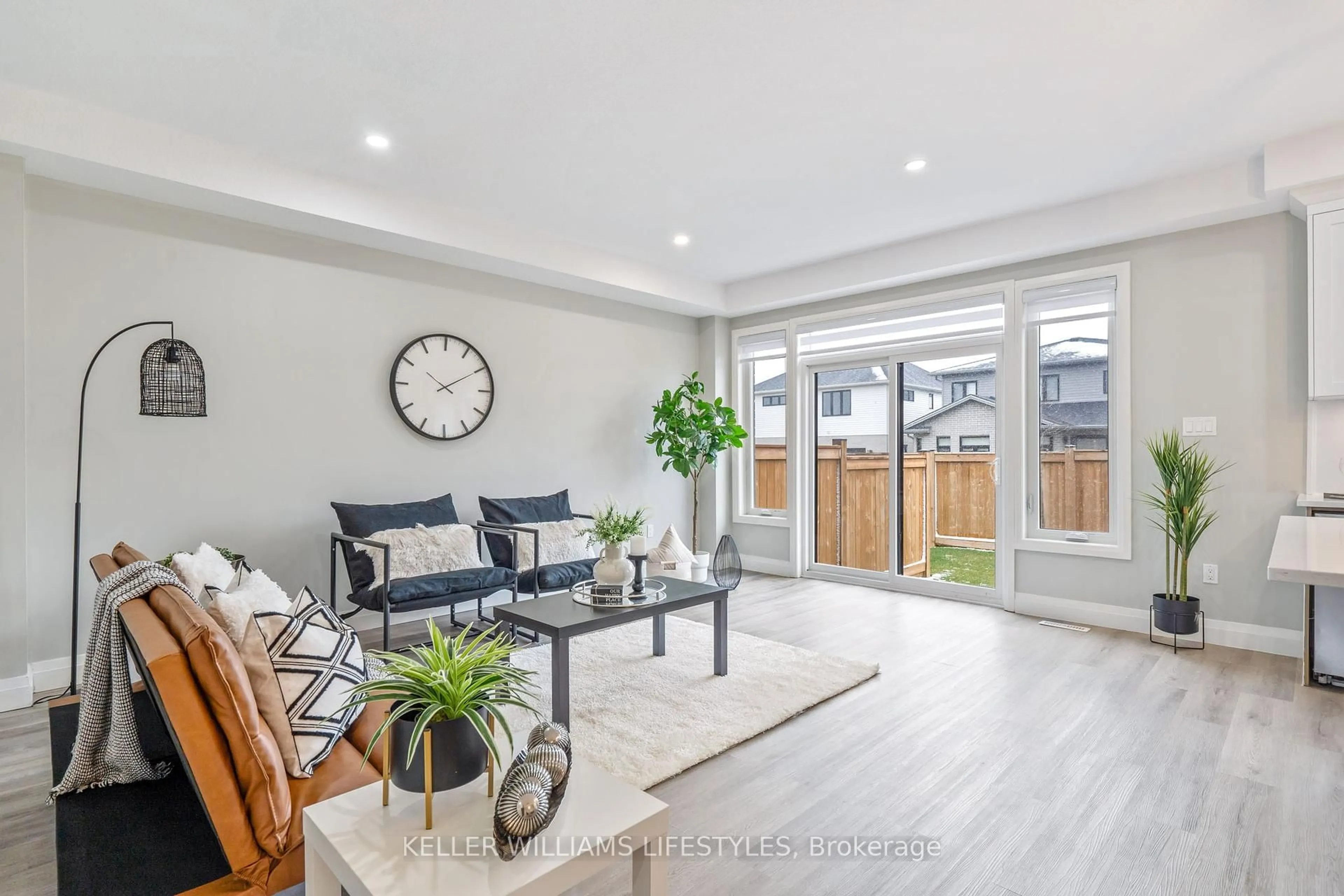 Living room with furniture, unknown for 93 Stonefield Lane #108, Middlesex Centre Ontario N0M 2A0