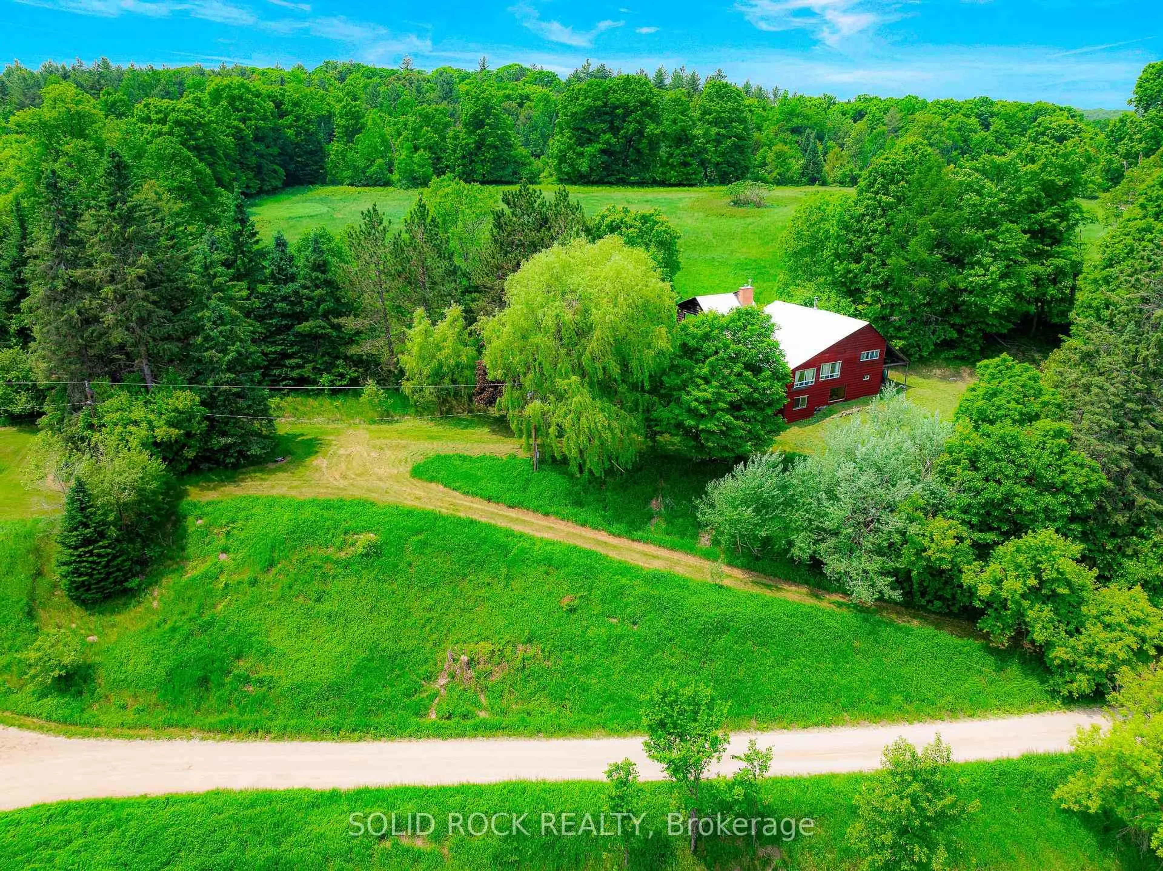 A pic from outside/outdoor area/front of a property/back of a property/a pic from drone, forest/trees view for 117 Folger Rd, Lanark Ontario K0G 1K0