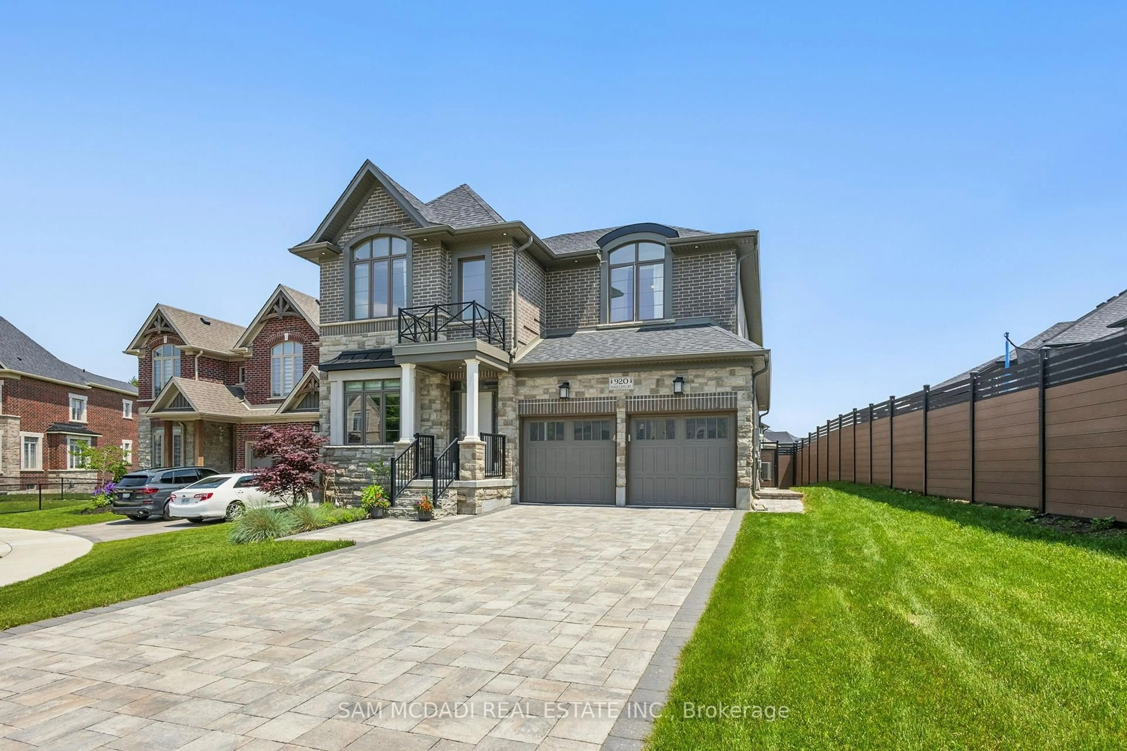 Home with brick exterior material, street for 920 Pondcliffe Dr, Kitchener Ontario N2R 0M9
