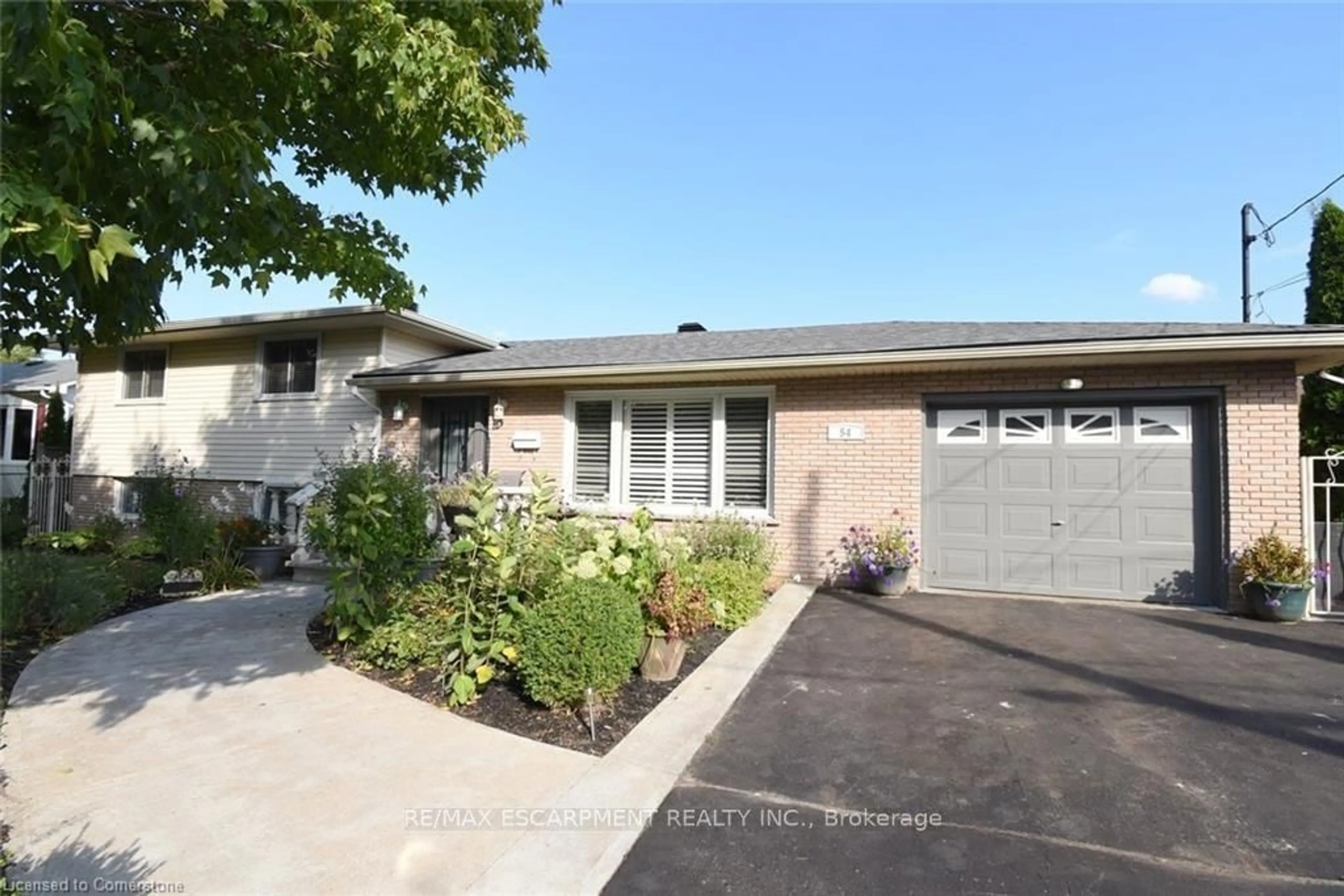 Home with brick exterior material, street for 54 Chester Rd, Hamilton Ontario L8E 1Y2