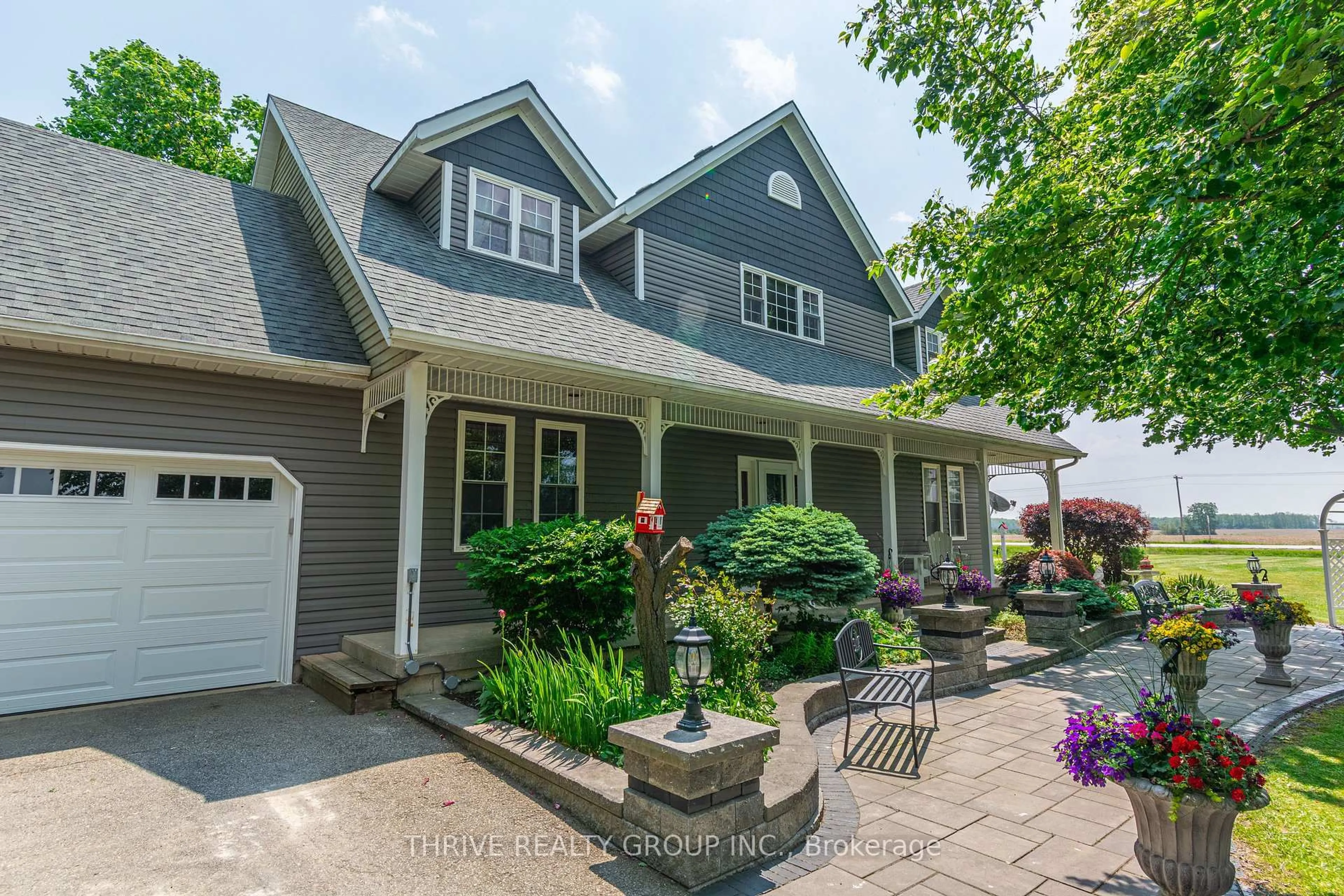 Home with vinyl exterior material, street for 6228 Bethel Rd, Warwick Ontario N0M 2S0
