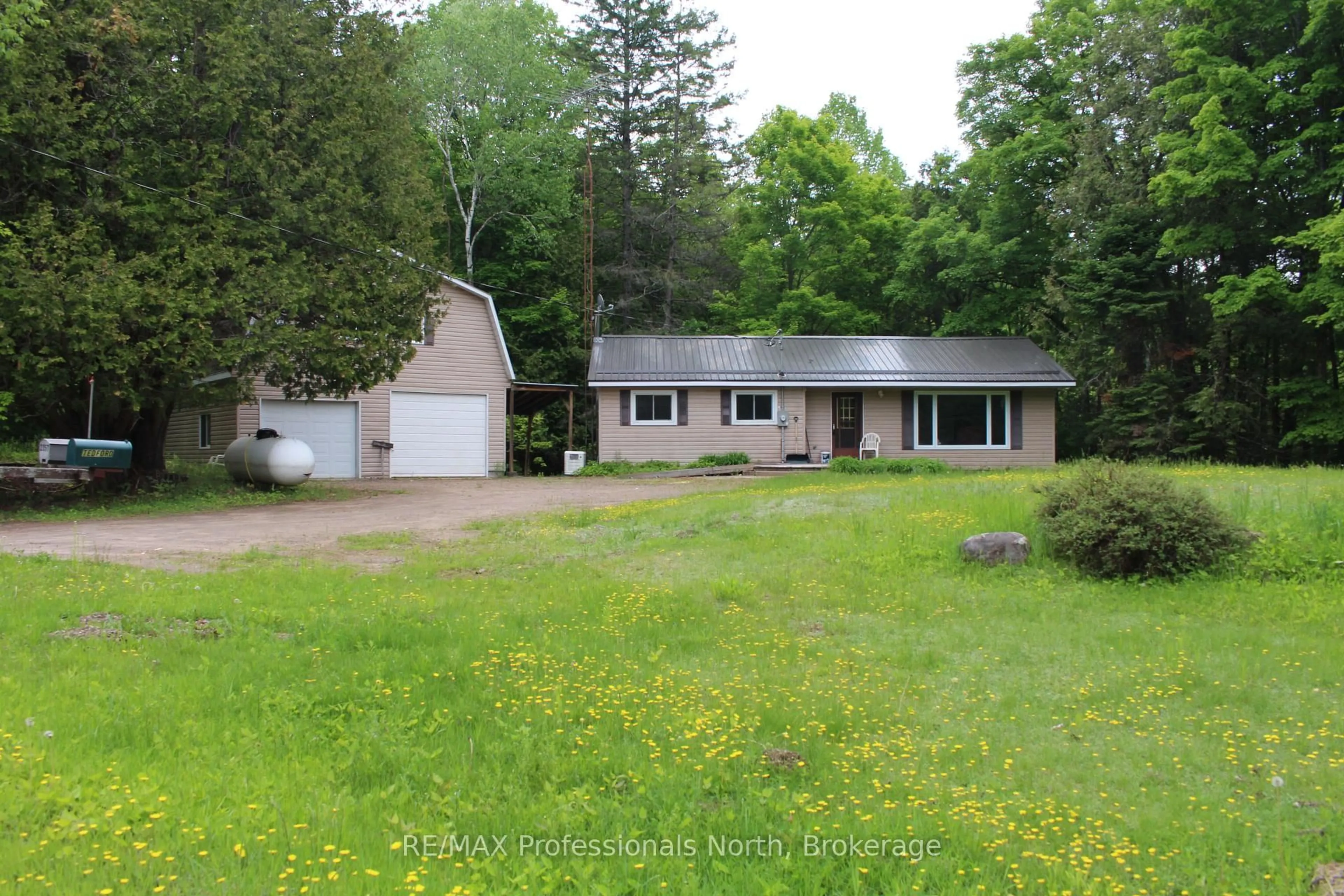A pic from outside/outdoor area/front of a property/back of a property/a pic from drone, unknown for 2166 Blairhampton Rd, Minden Hills Ontario K0M 2K0