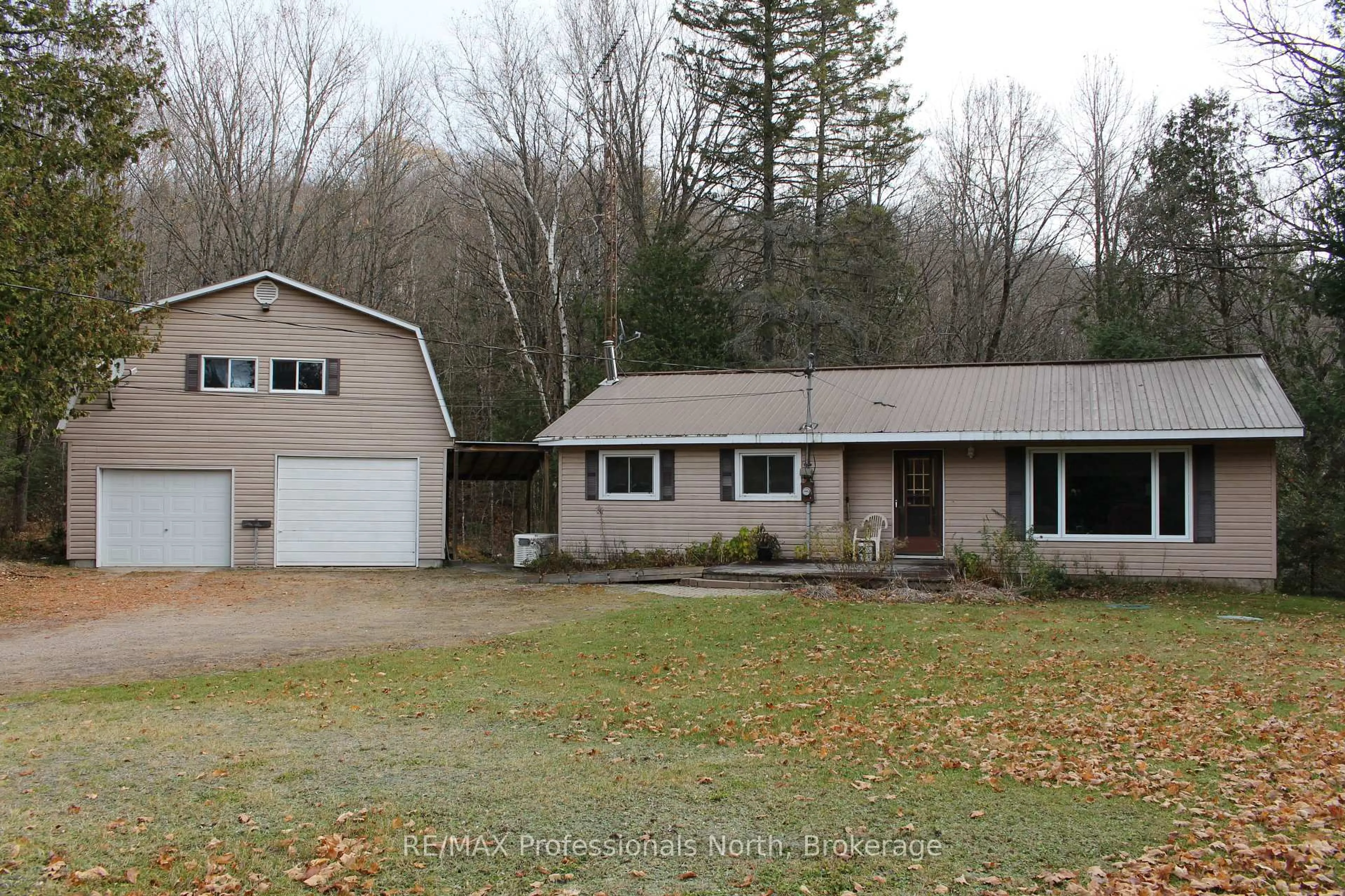 A pic from outside/outdoor area/front of a property/back of a property/a pic from drone, unknown for 2166 Blairhampton Rd, Minden Hills Ontario K0M 2K0