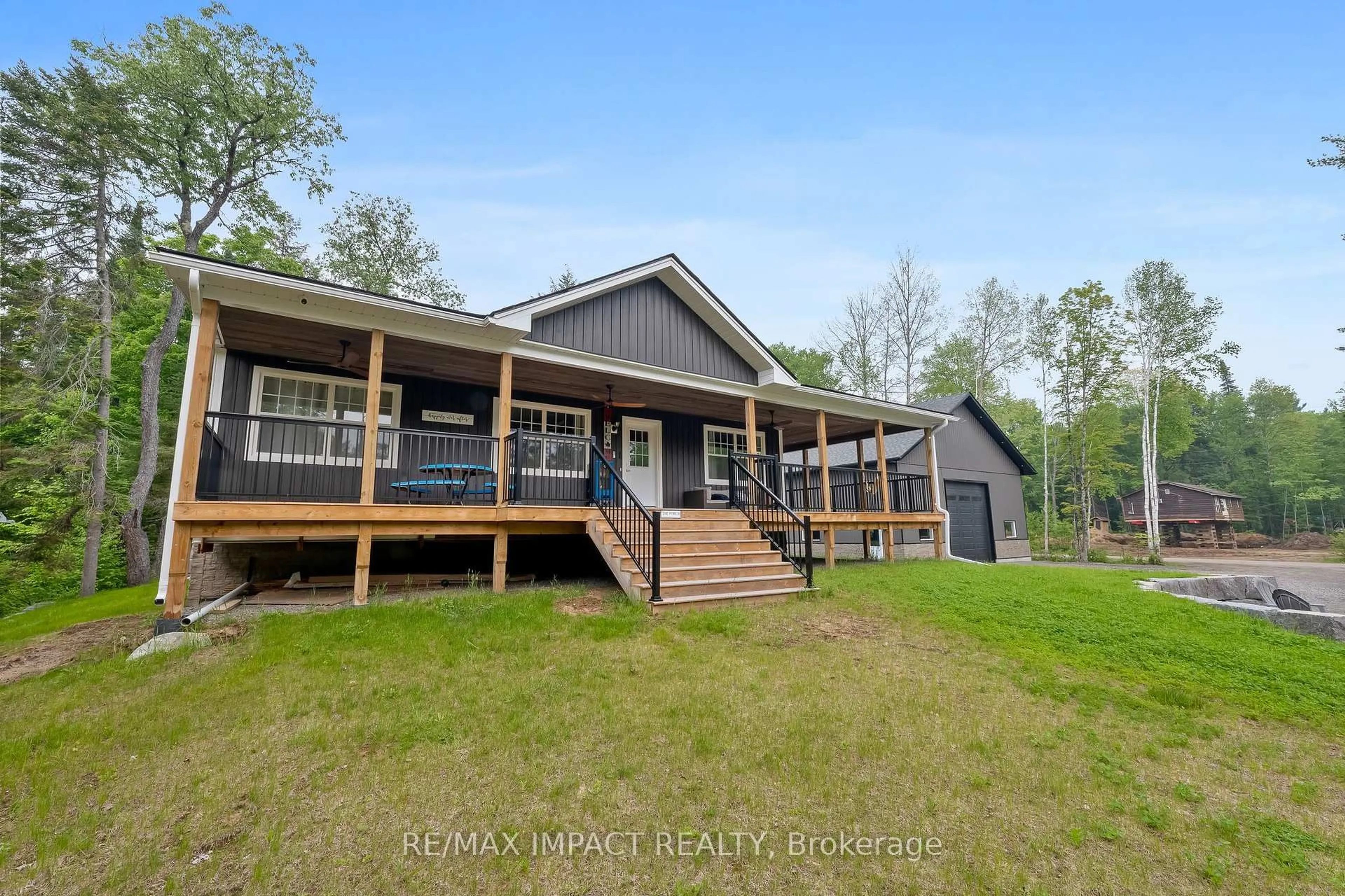 A pic from outside/outdoor area/front of a property/back of a property/a pic from drone, water/lake/river/ocean view for 1006 Jasmine Rd, Dysart et al Ontario K0L 1M1