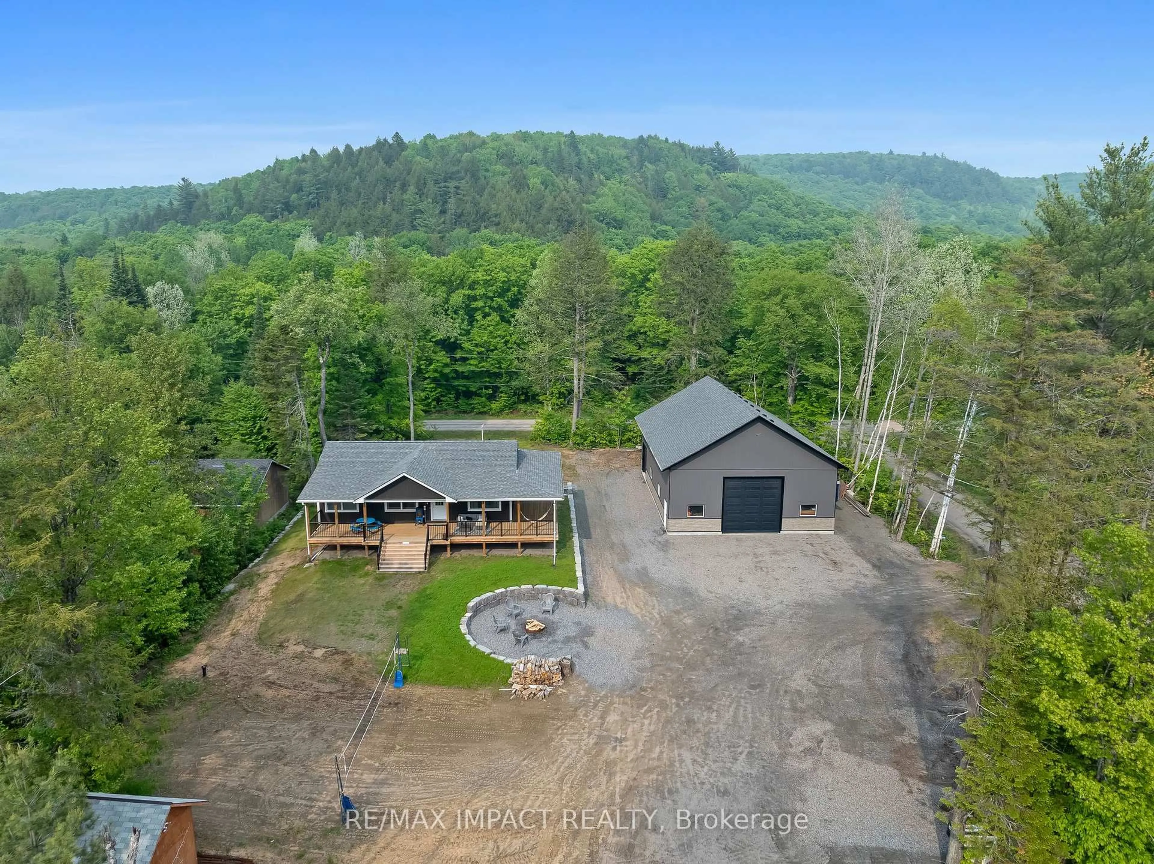 A pic from outside/outdoor area/front of a property/back of a property/a pic from drone, unknown for 1006 Jasmine Rd, Dysart et al Ontario K0L 1M1