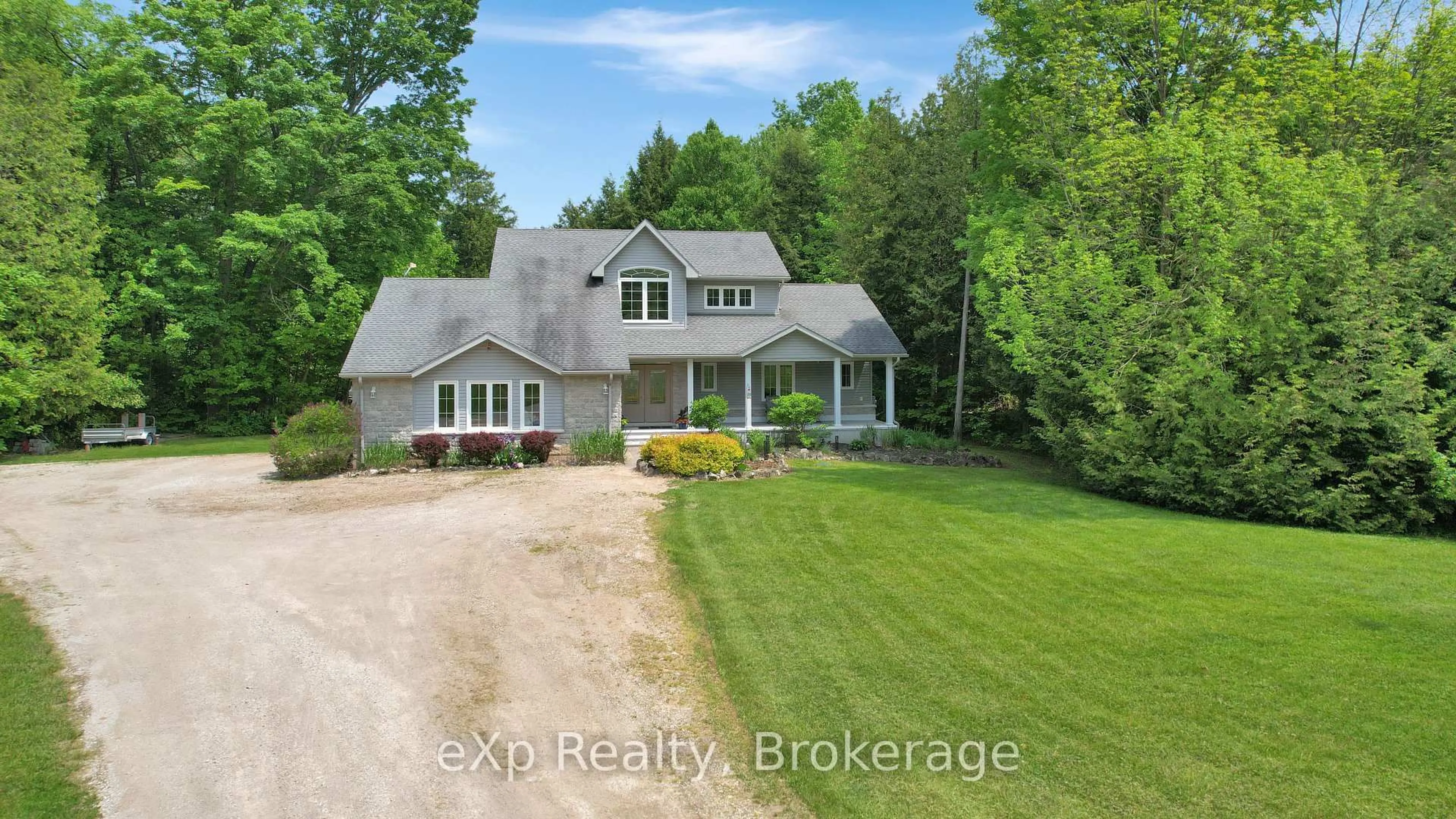 A pic from outside/outdoor area/front of a property/back of a property/a pic from drone, water/lake/river/ocean view for 527 Lake Rosalind Road 5, Brockton Ontario N4N 3B9