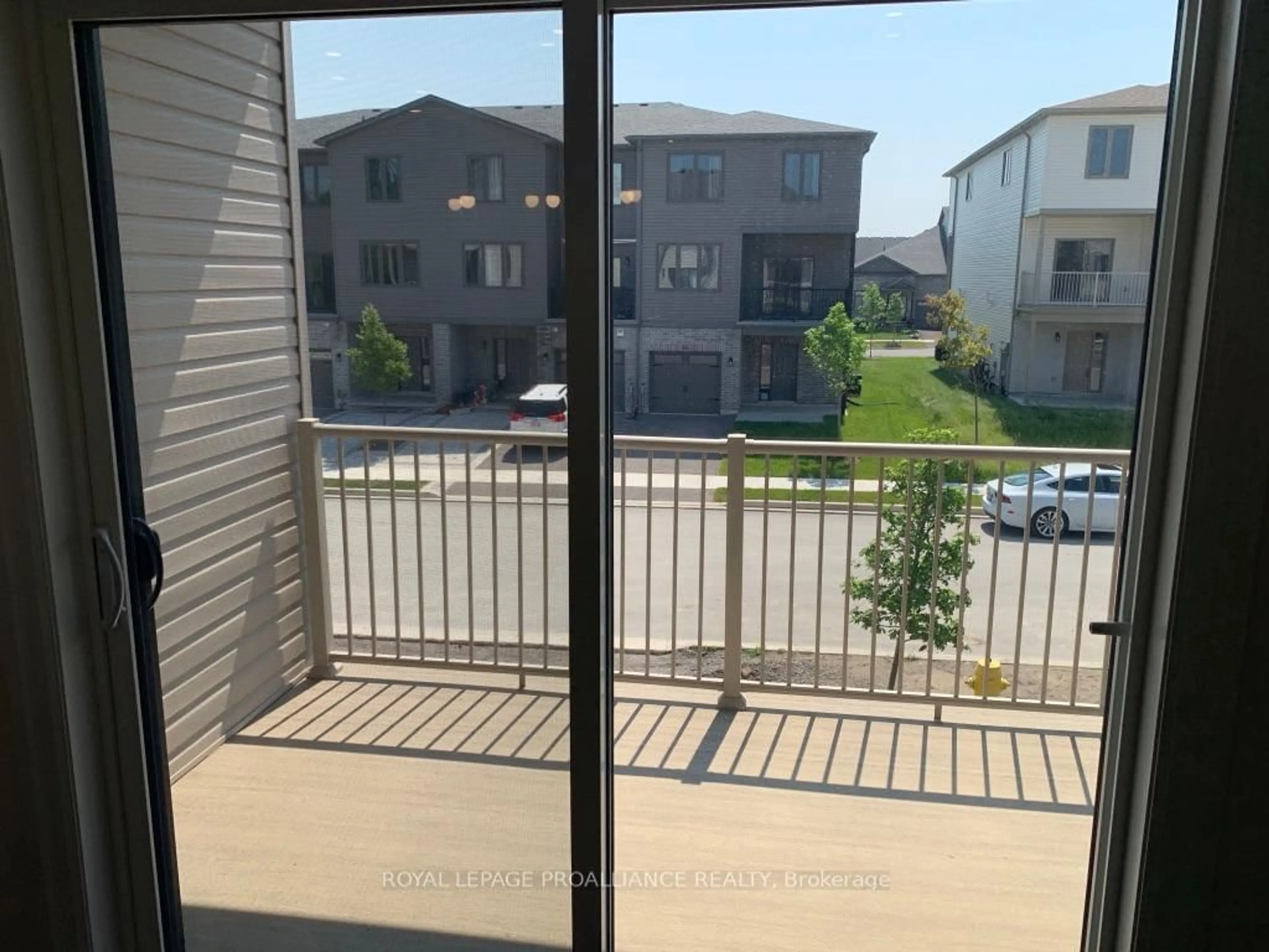 Balcony in the apartment, city buildings view from balcony for 65 Evans St, Prince Edward County Ontario K0K 2T0