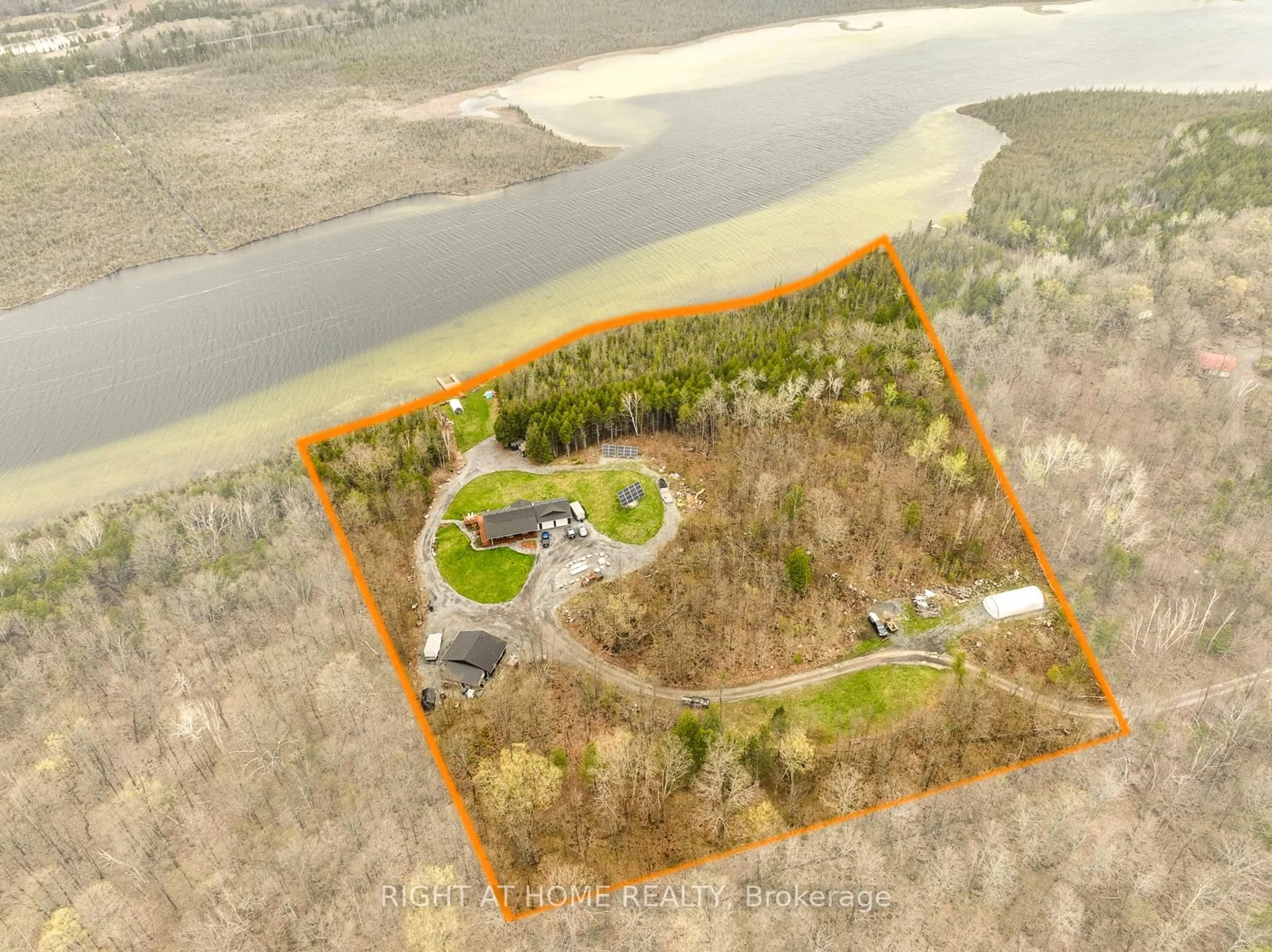A pic from outside/outdoor area/front of a property/back of a property/a pic from drone, water/lake/river/ocean view for 452A COLDWATER Rd, Tweed Ontario K0K 2L0