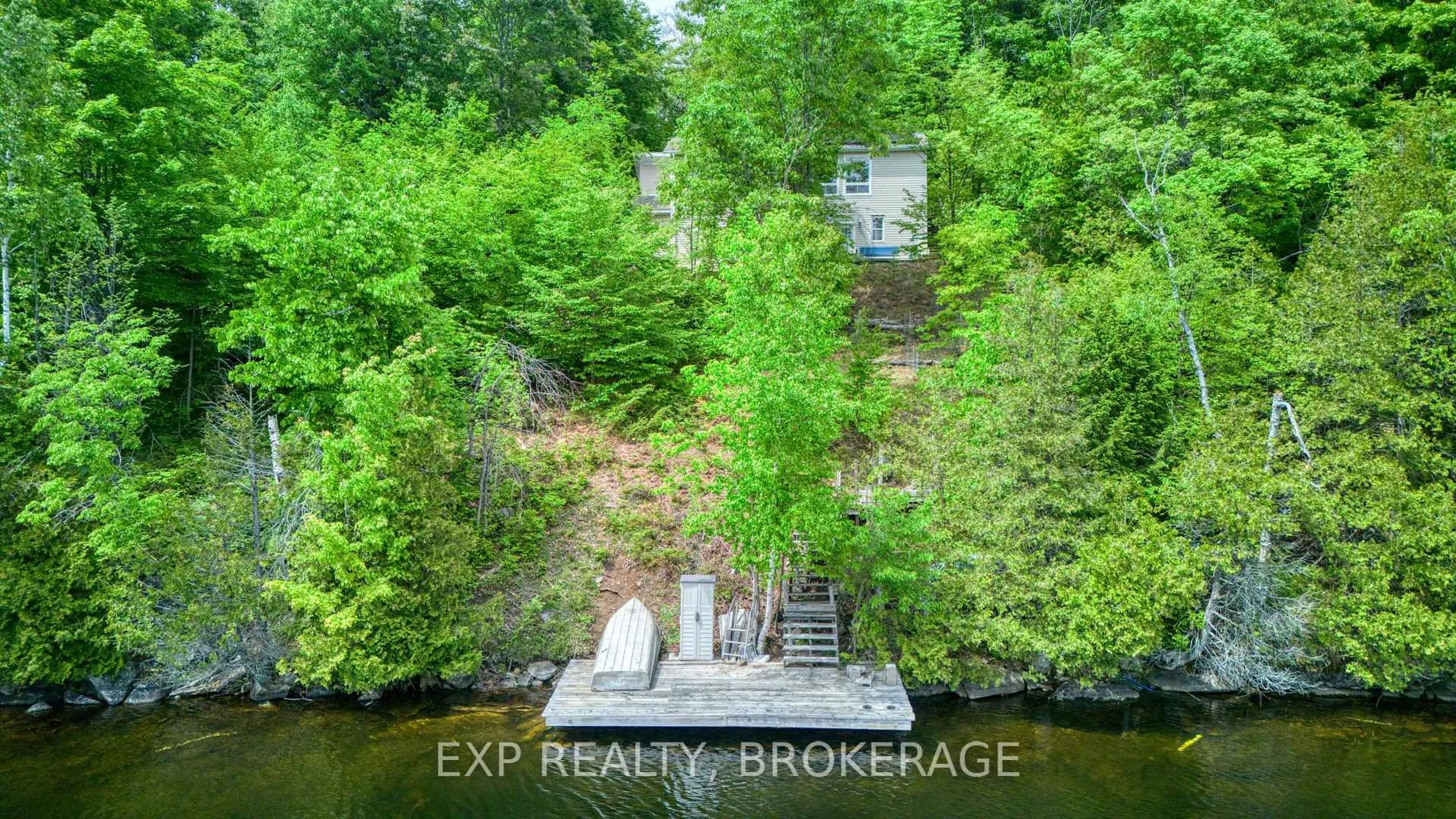A pic from outside/outdoor area/front of a property/back of a property/a pic from drone, water/lake/river/ocean view for 1076 Valley Lane, Sharbot Lake Ontario K0H 2P0