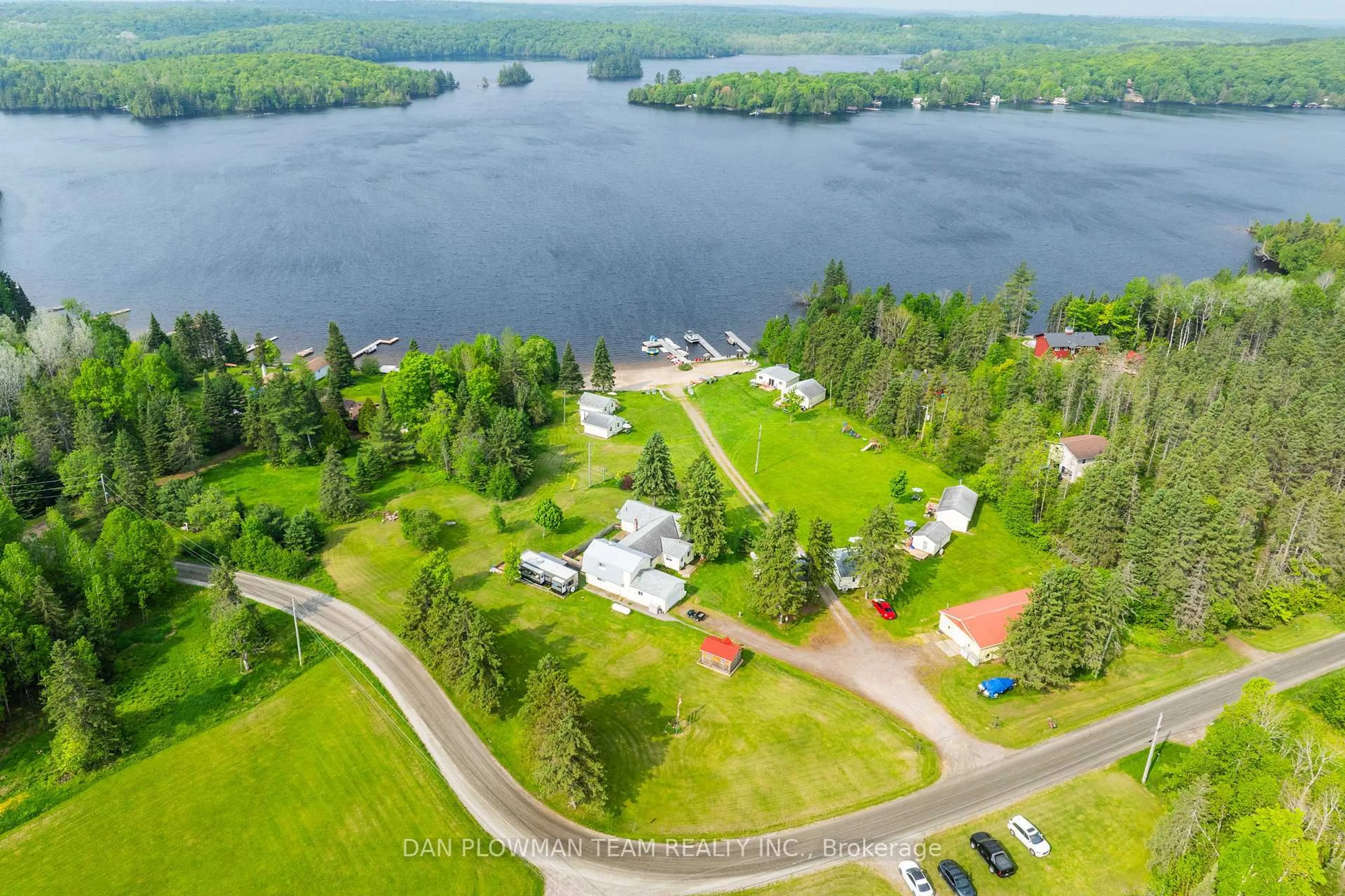 A pic from outside/outdoor area/front of a property/back of a property/a pic from drone, water/lake/river/ocean view for 184/189 Chapman Dr, Magnetawan Ontario P0A 1C0
