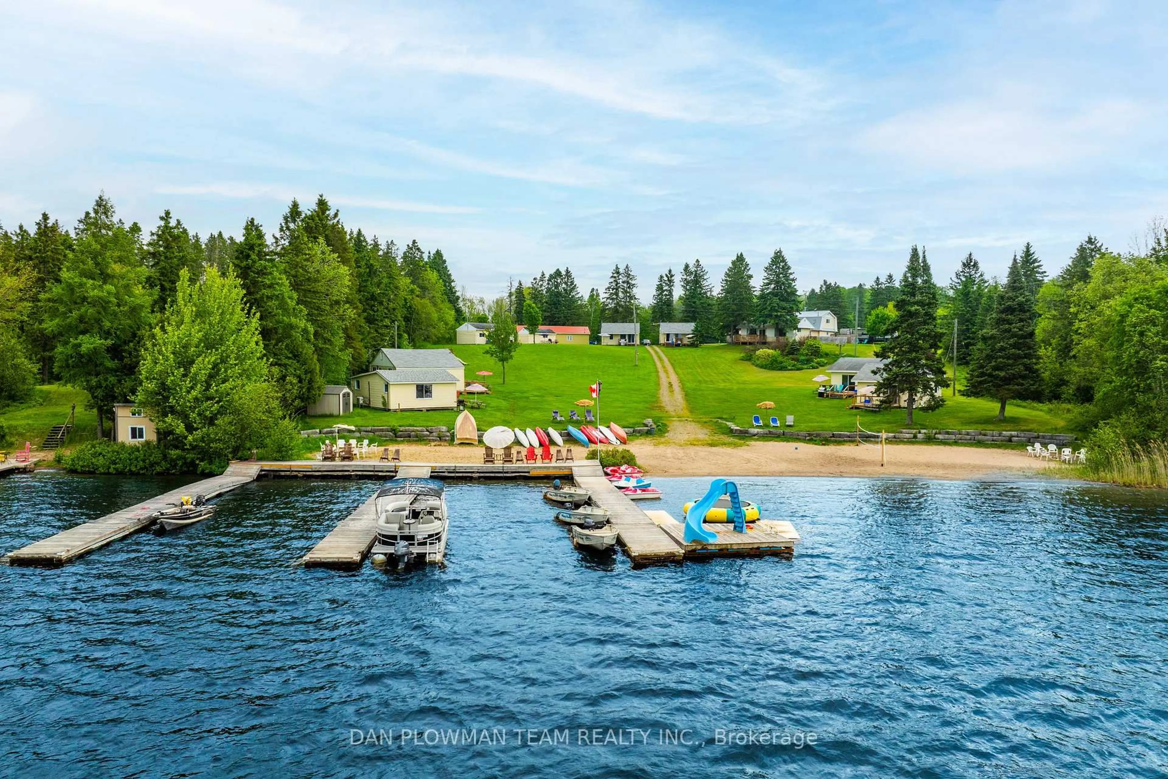 A pic from outside/outdoor area/front of a property/back of a property/a pic from drone, water/lake/river/ocean view for 184/189 Chapman Dr, Magnetawan Ontario P0A 1C0