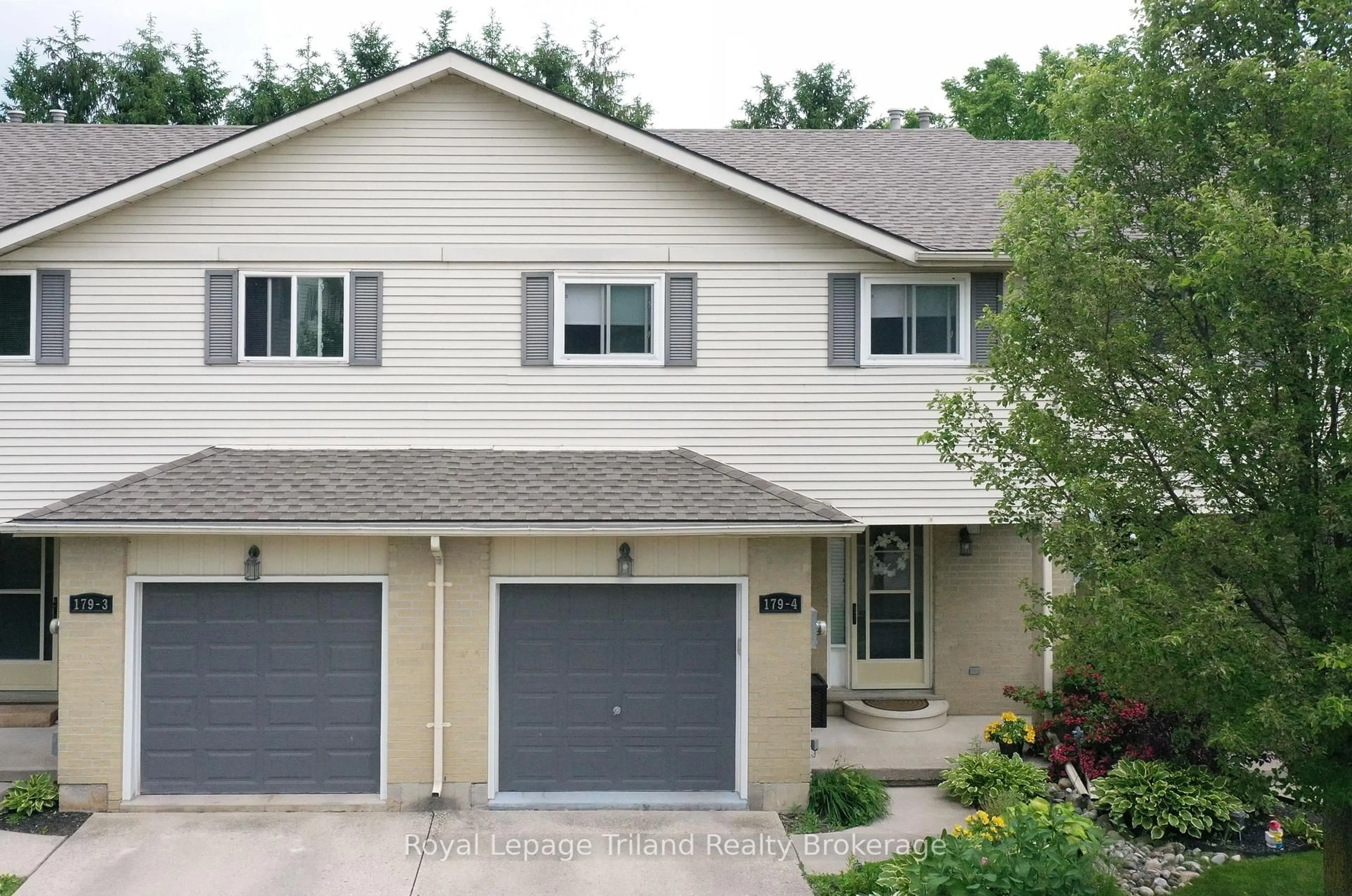 Home with vinyl exterior material, street for 179 Ferguson Dr ##4, Woodstock Ontario N4V 1A5