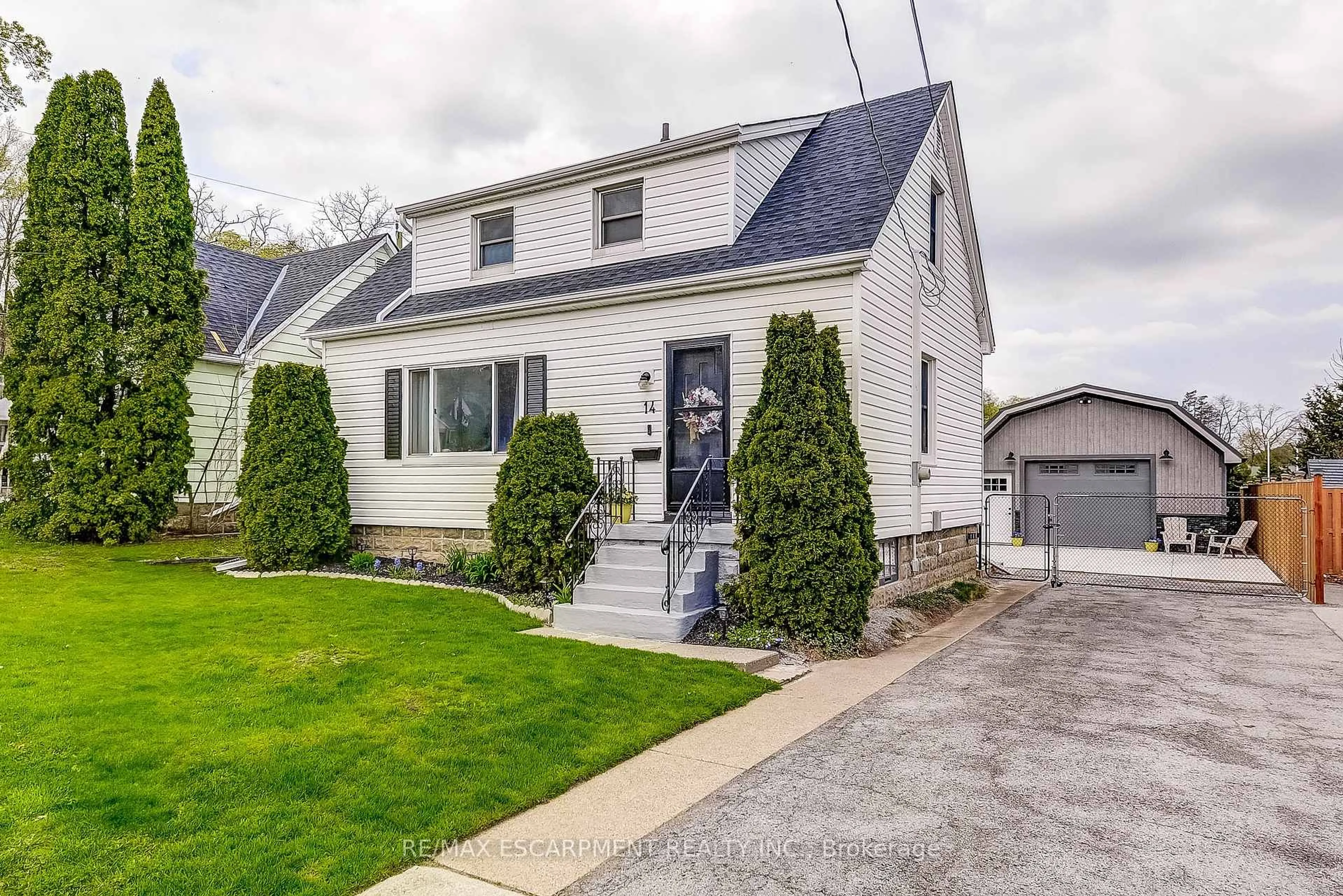 Home with vinyl exterior material, street for 14 WALKER Ave, Hamilton Ontario L8G 1S6