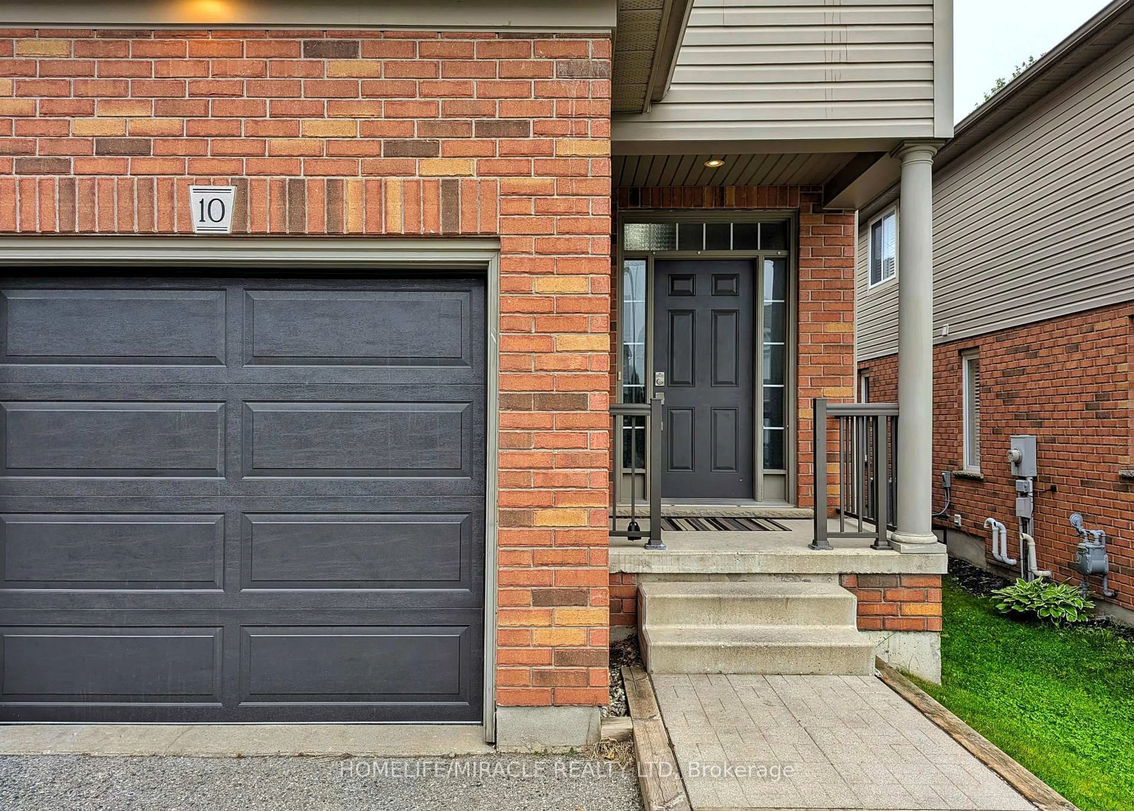 Home with brick exterior material, street for 10 Tudor St, Kitchener Ontario N2R 1W3