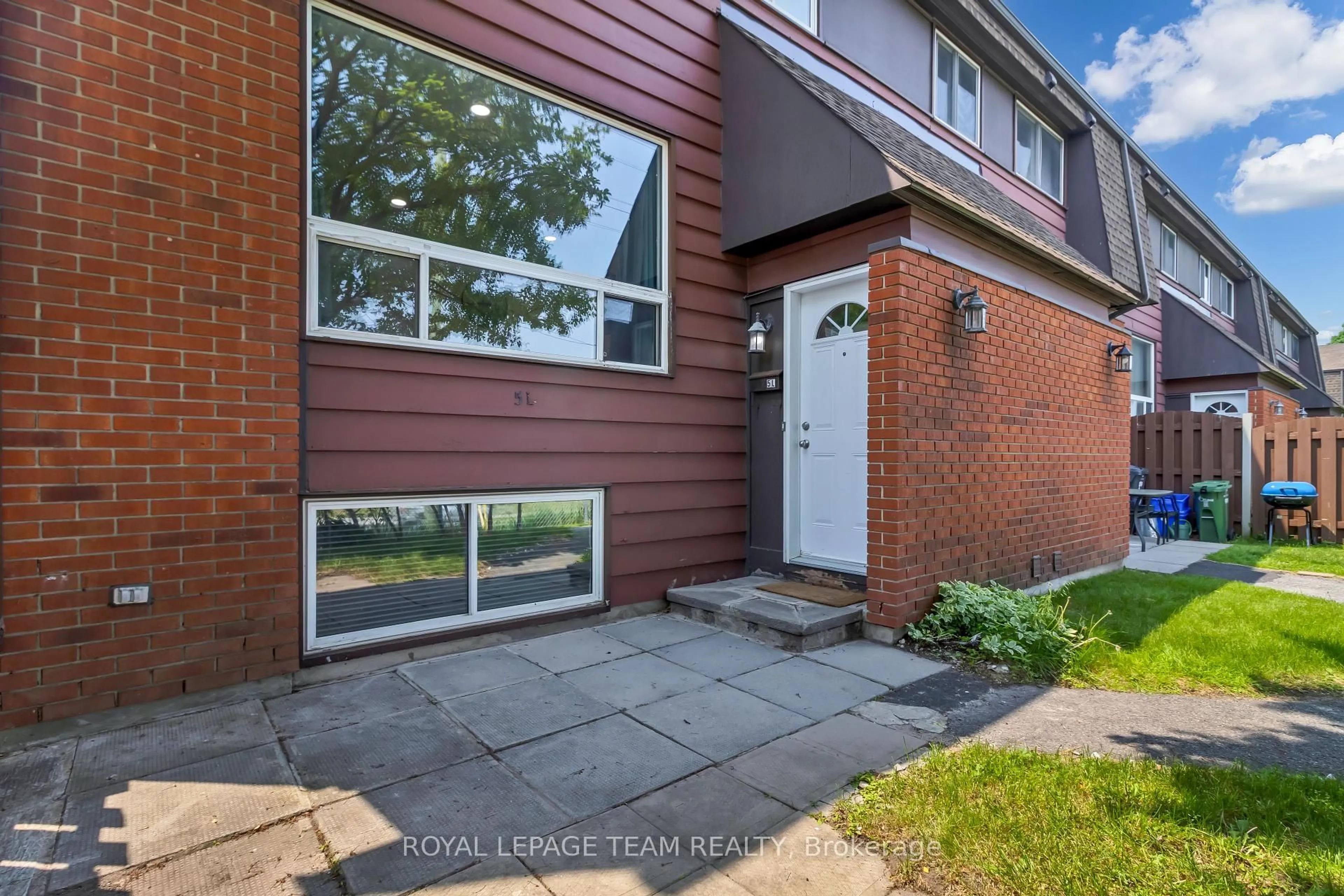 Home with brick exterior material, street for 5 Banner Rd #L, Ottawa Ontario K2H 8T3