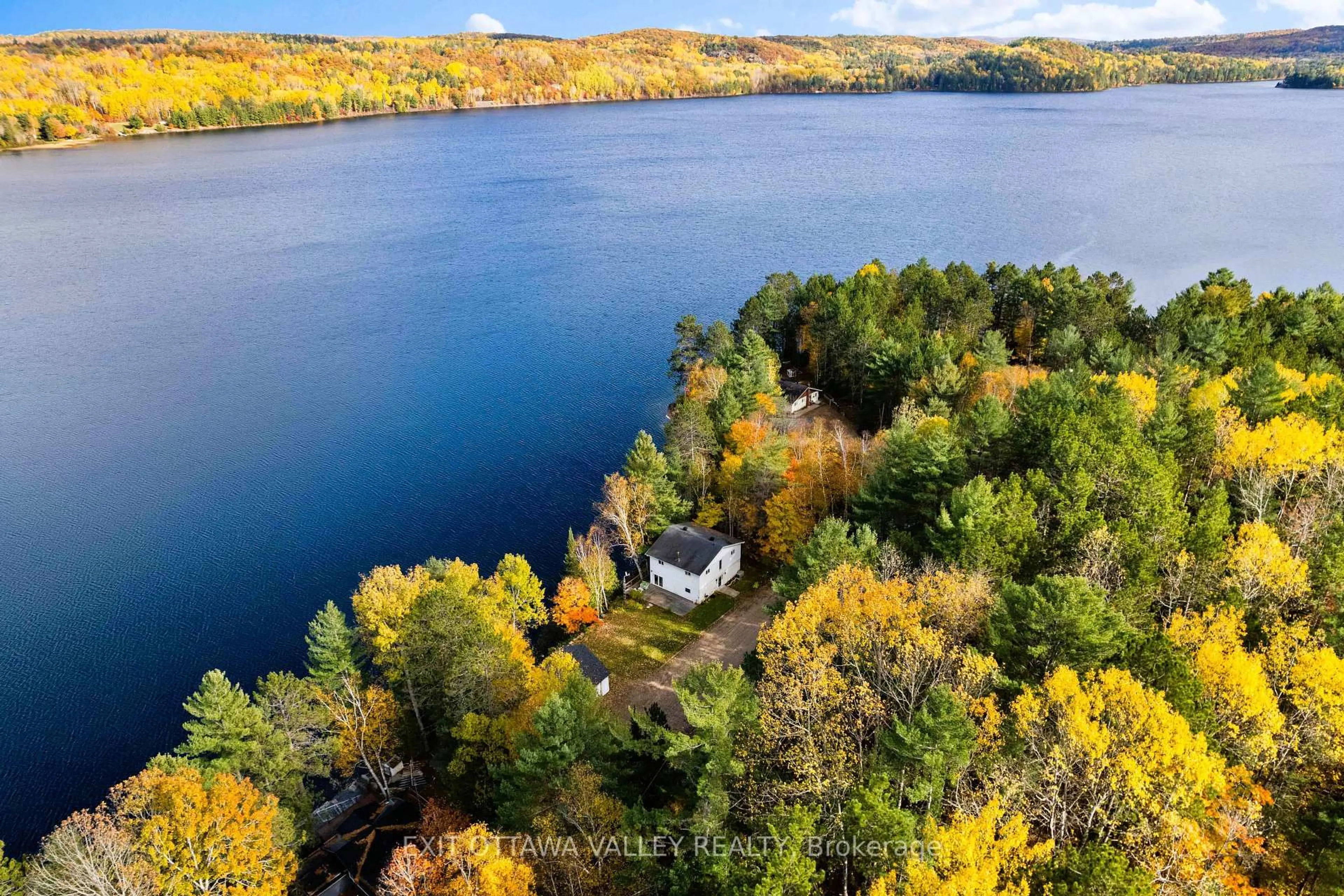 A pic from outside/outdoor area/front of a property/back of a property/a pic from drone, water/lake/river/ocean view for 88 Chris Mullin Lane, Barry's Bay Ontario K0J 1B0