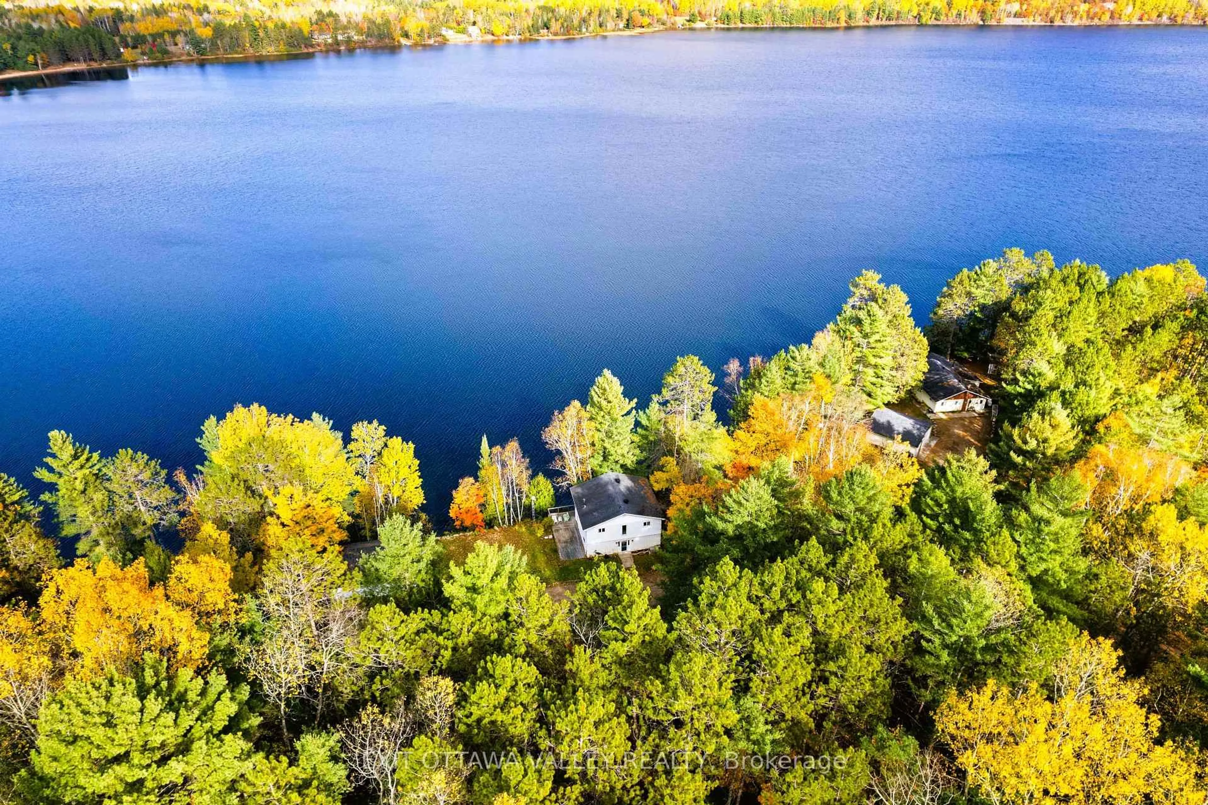 A pic from outside/outdoor area/front of a property/back of a property/a pic from drone, water/lake/river/ocean view for 88 Chris Mullin Lane, Barry's Bay Ontario K0J 1B0